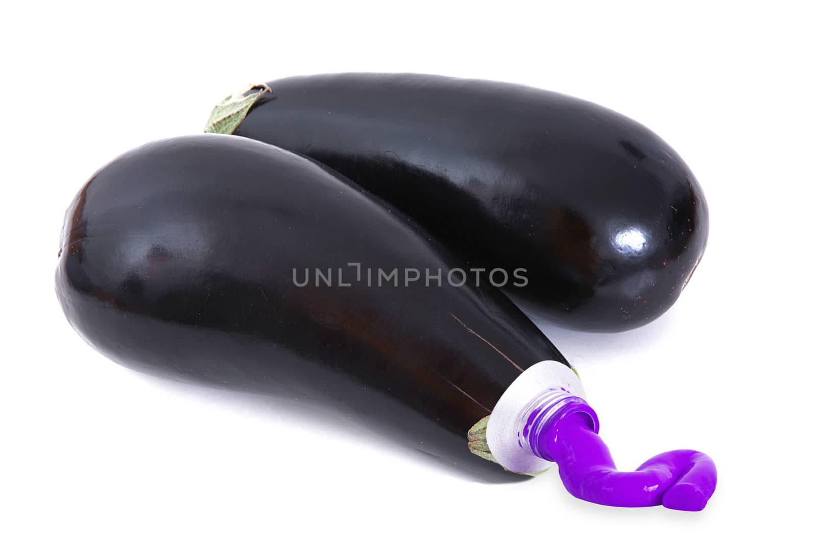 aubergines like a tube of paint on white background