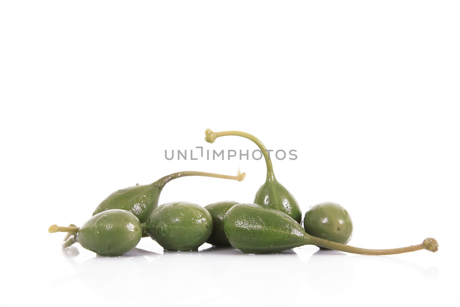 fresh capers on white background