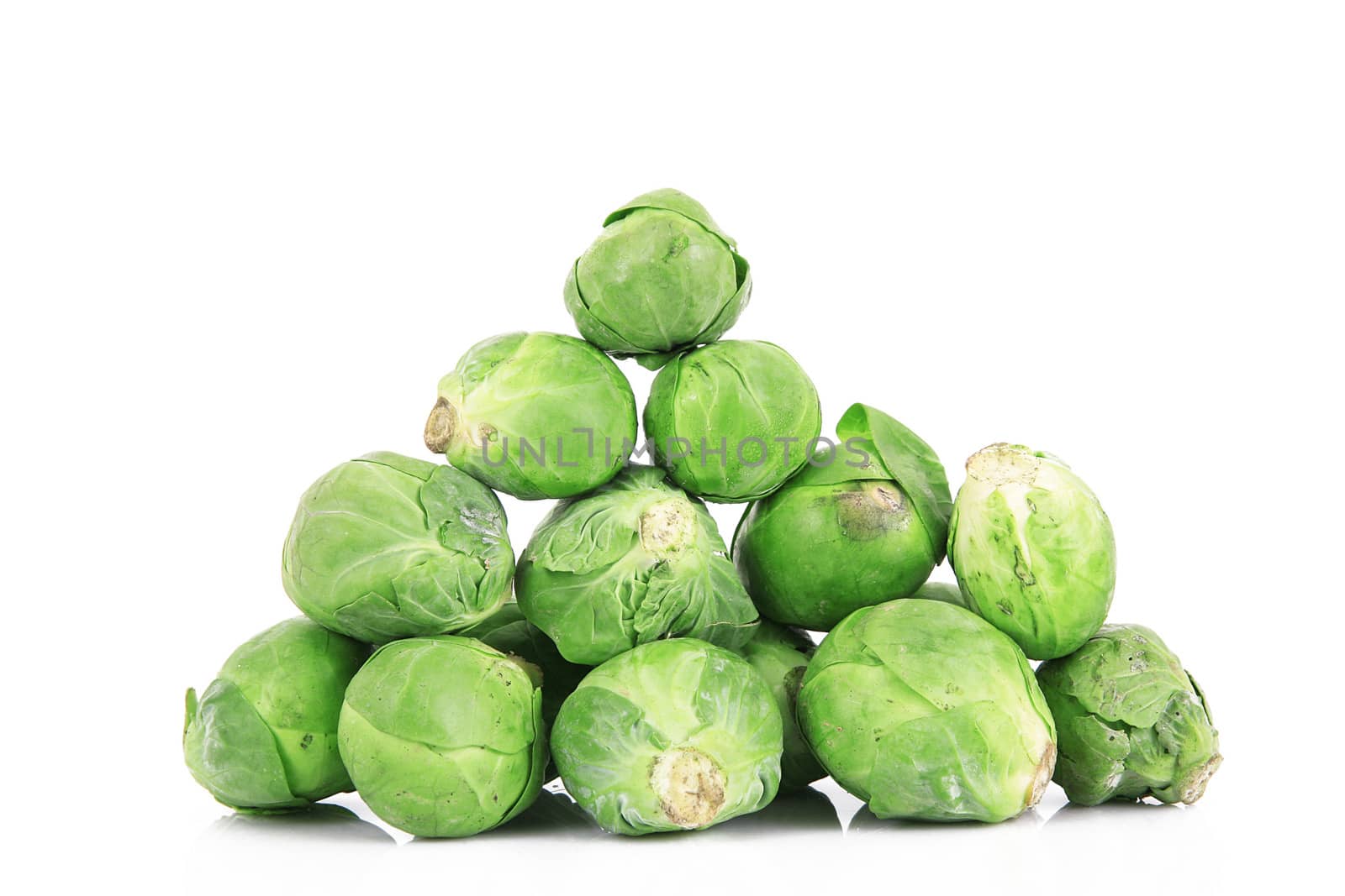 fresh brussels sprouts on white background