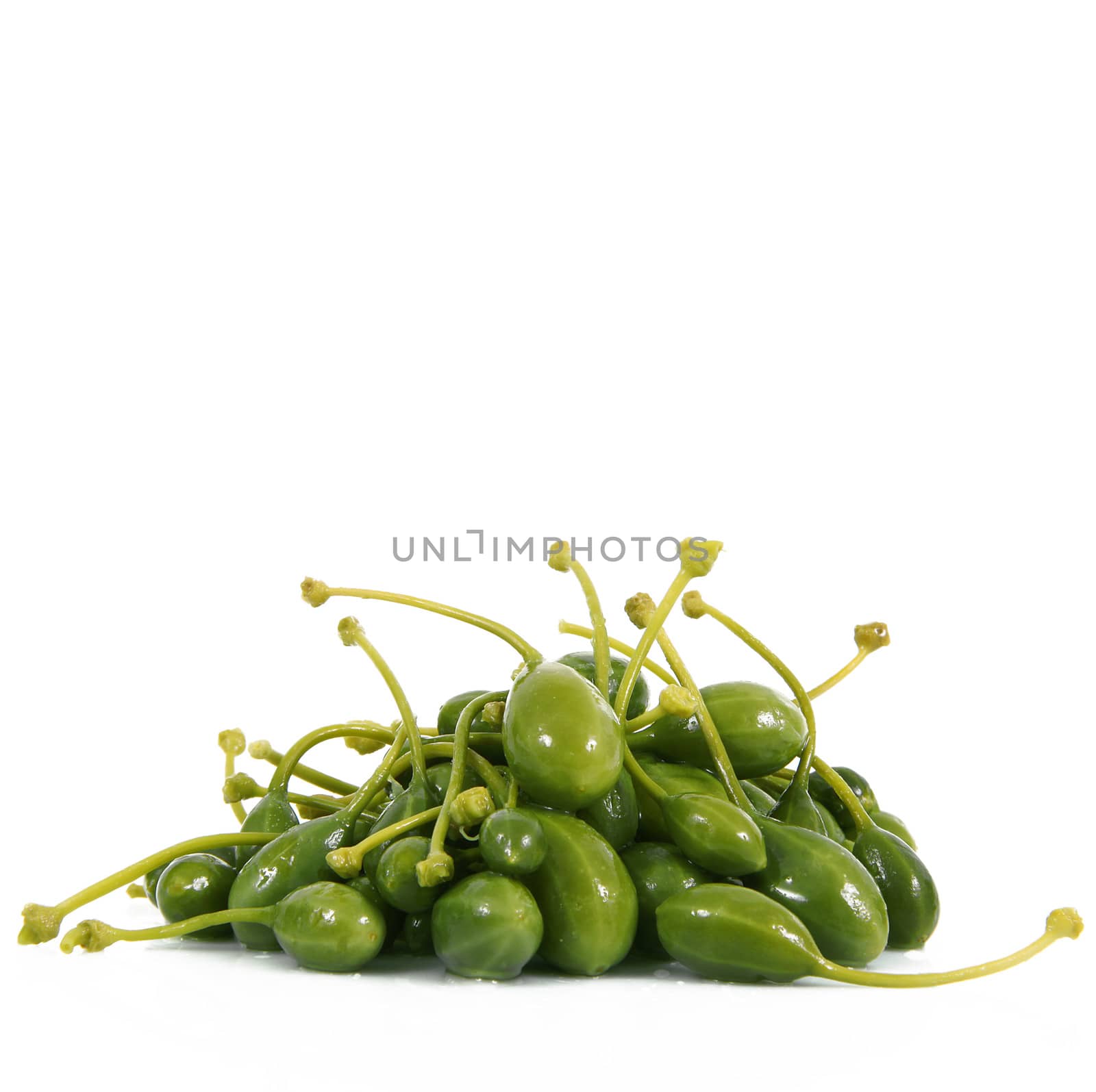 fresh capers on white background