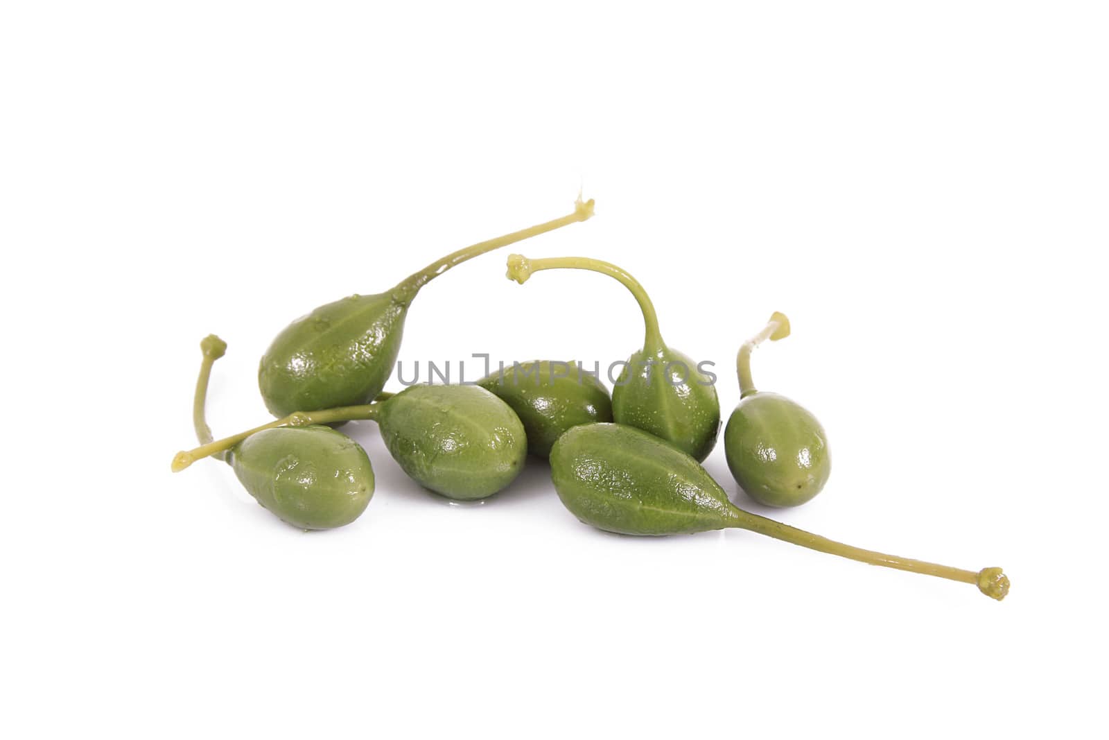 fresh capers on white background