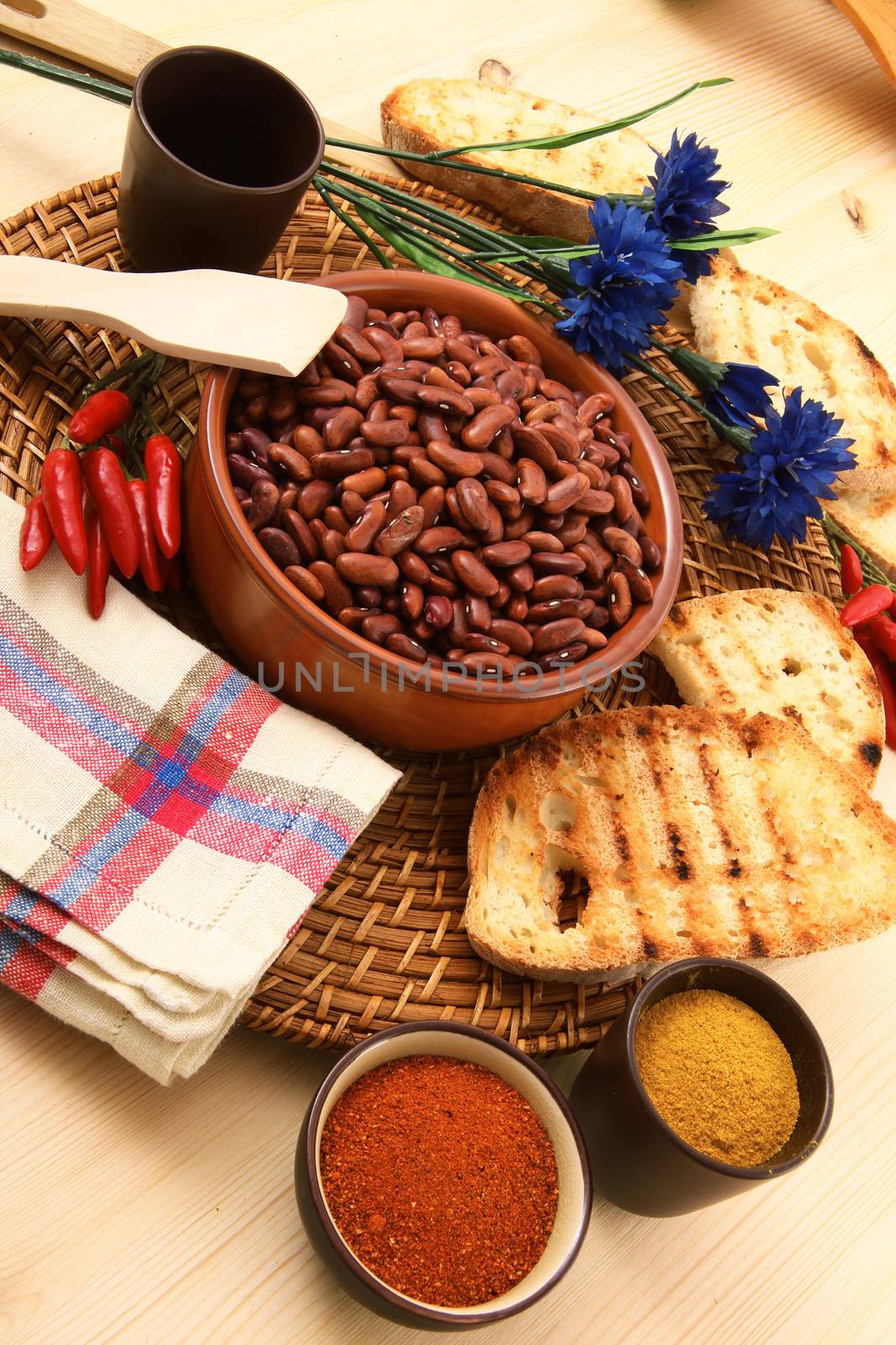 dry legumes in rustic dish on wooden table