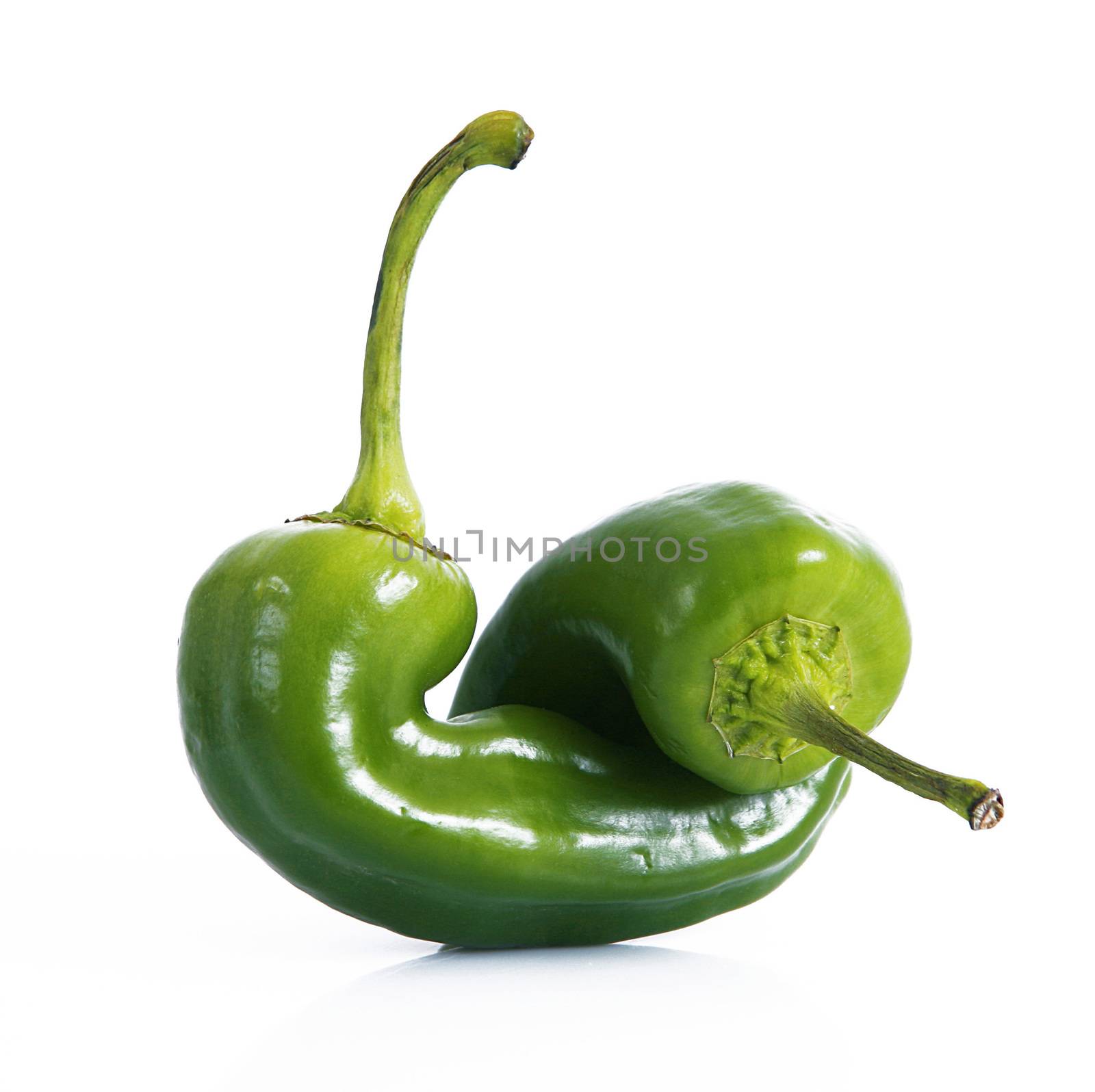 fresh hot peppers on white background