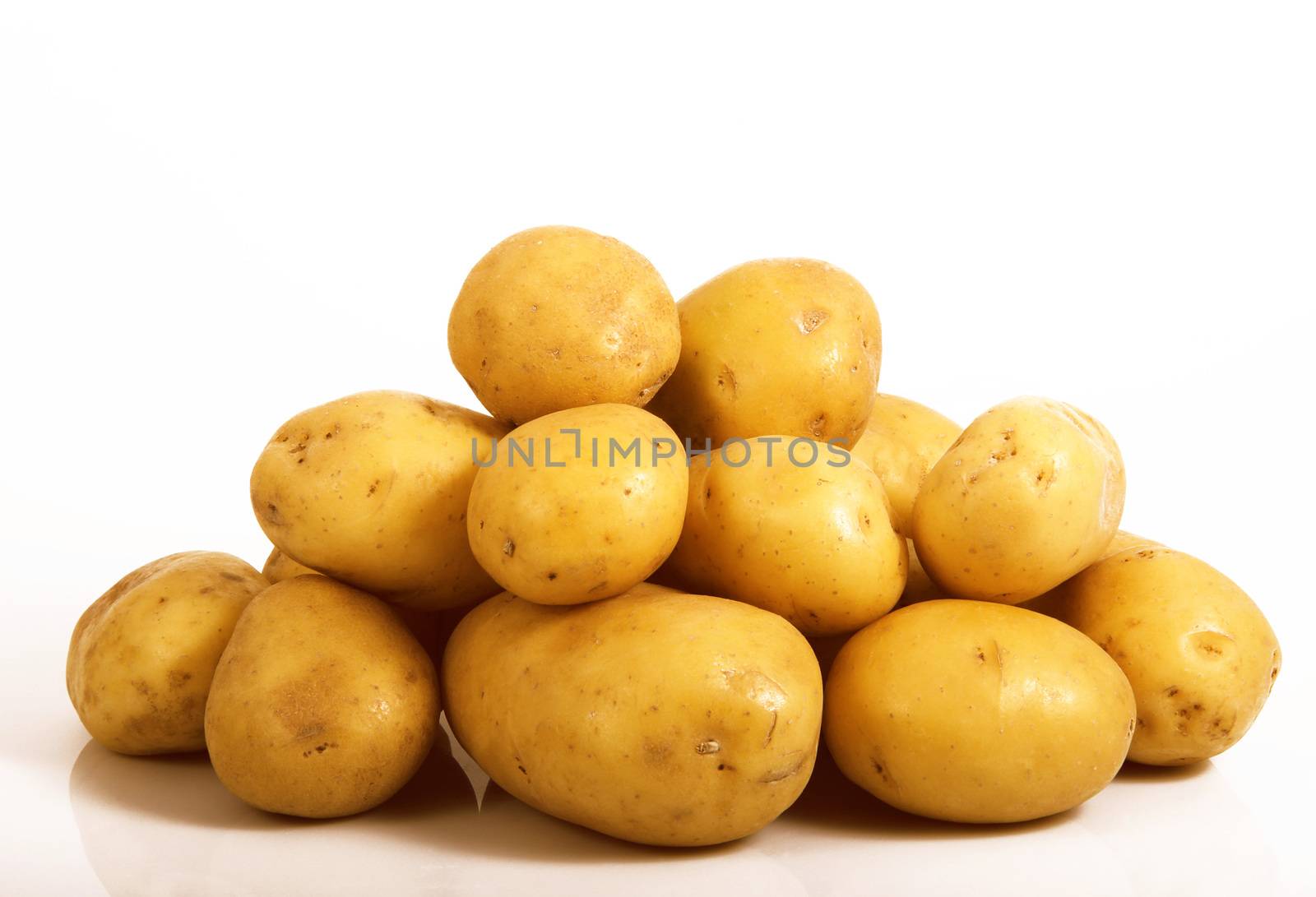 a fresh potatoes on white background