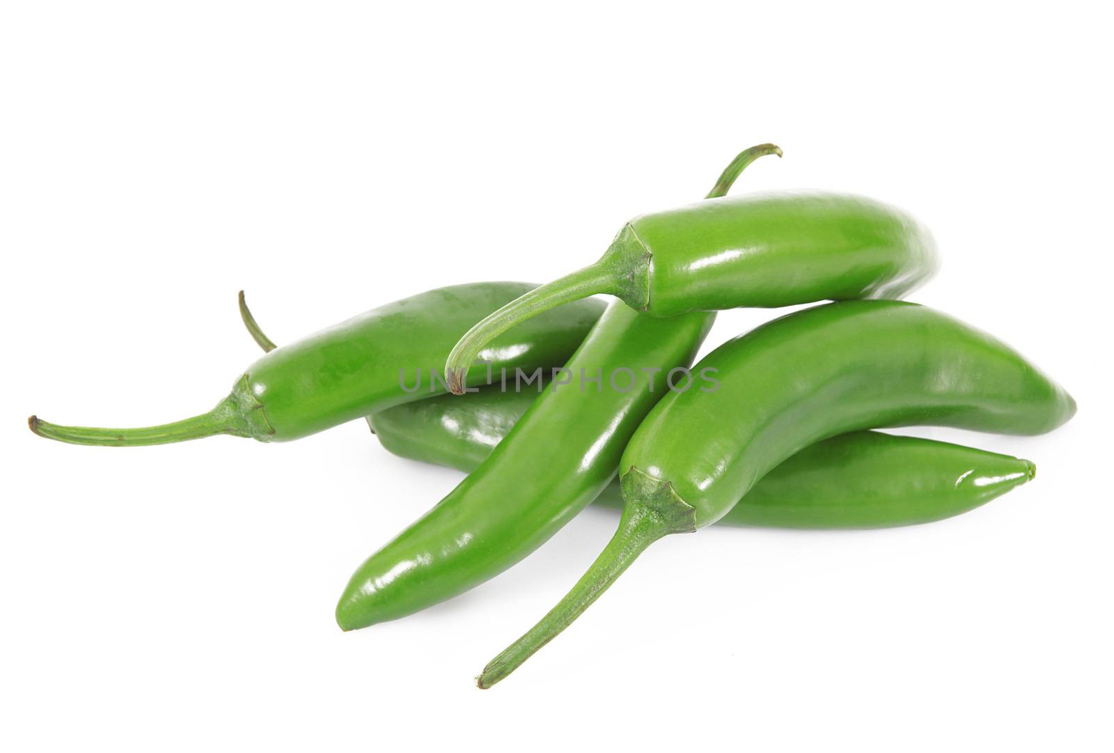 fresh hot peppers on white background
