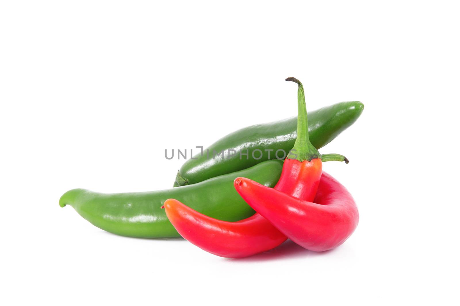 fresh hot peppers on white background