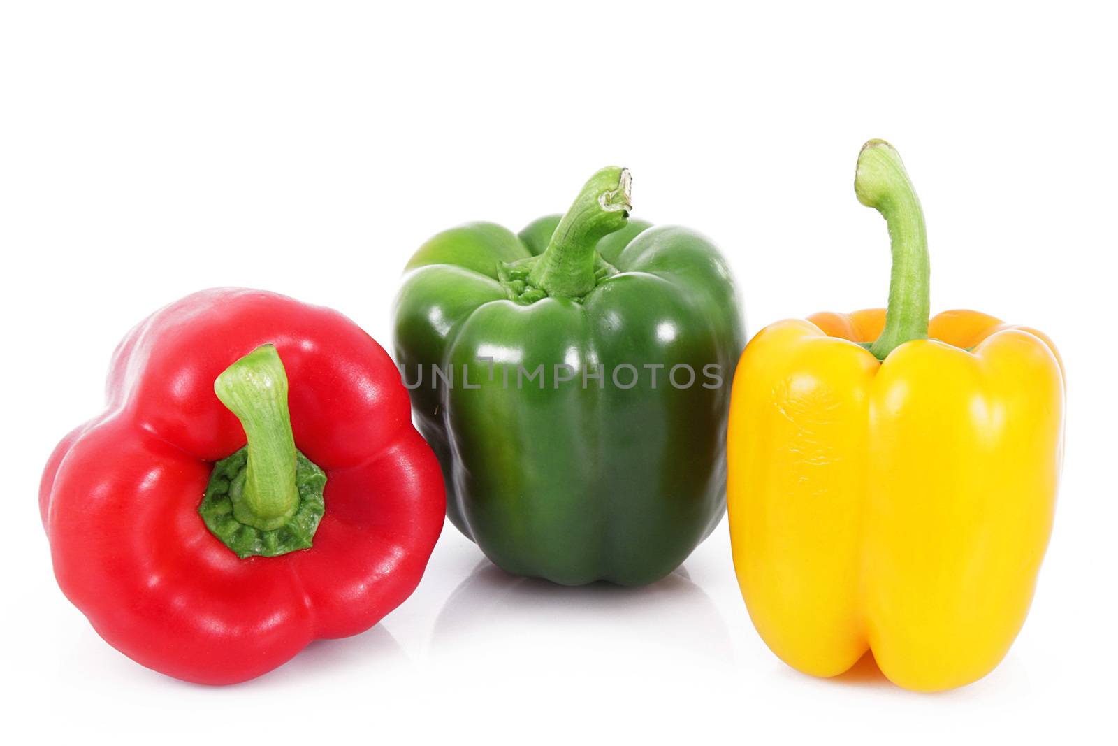 fresh hot peppers on white background