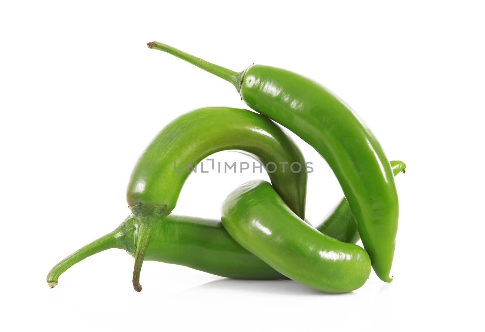 fresh hot peppers on white background