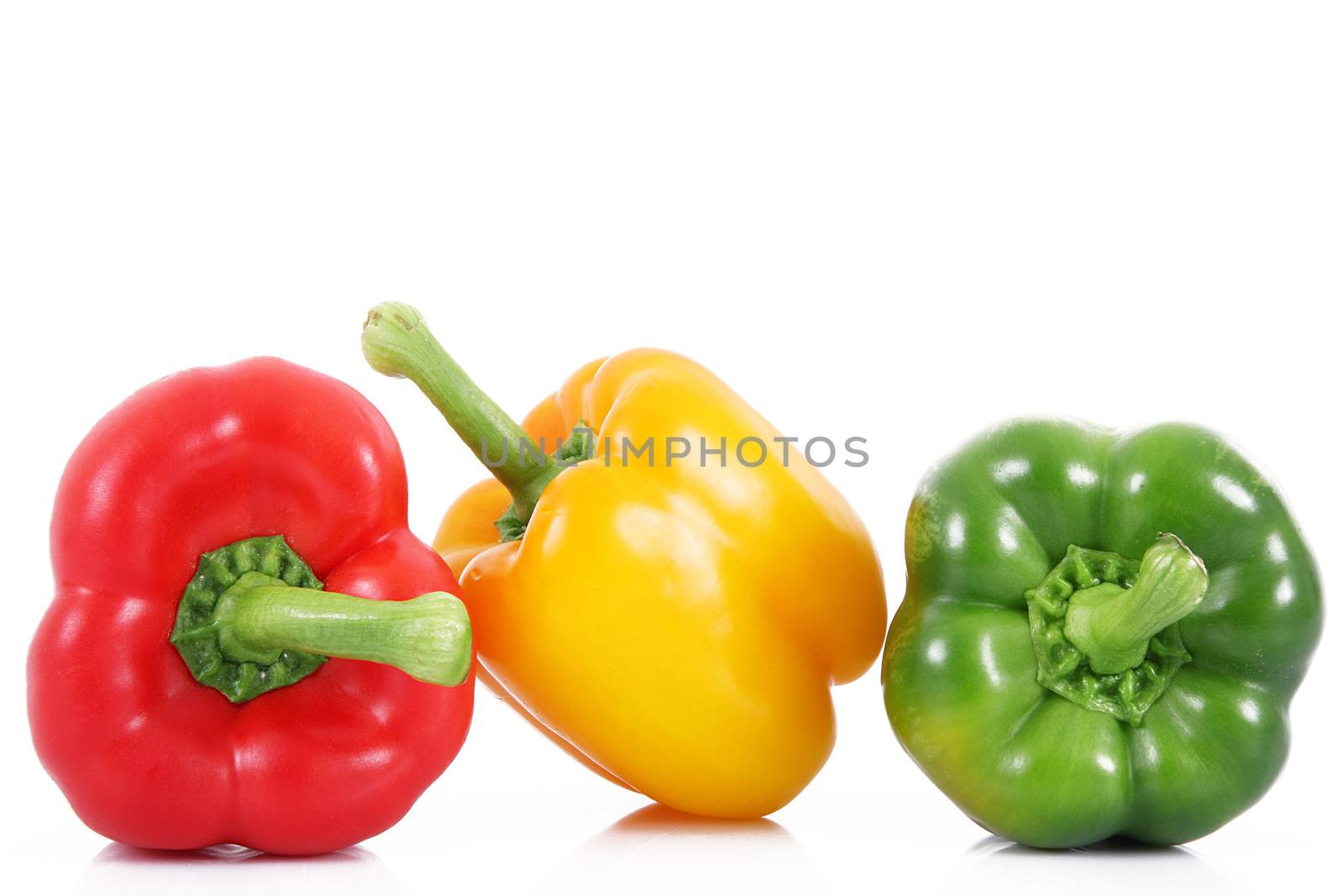 fresh hot peppers on white background