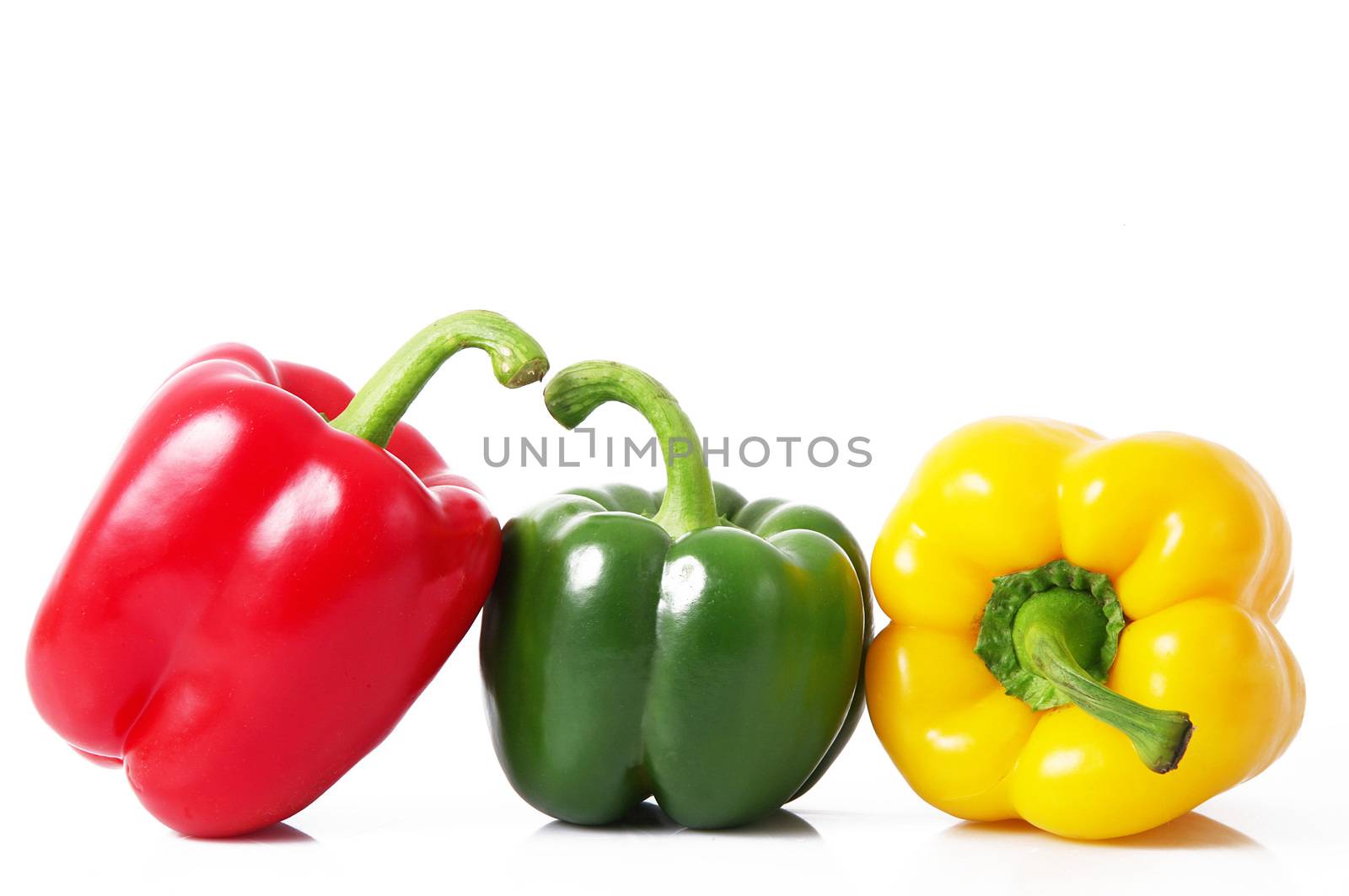 hot peppers on white background by photobeps