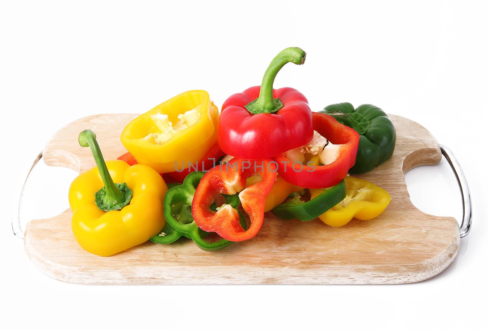 hot cut pepper on white background by photobeps