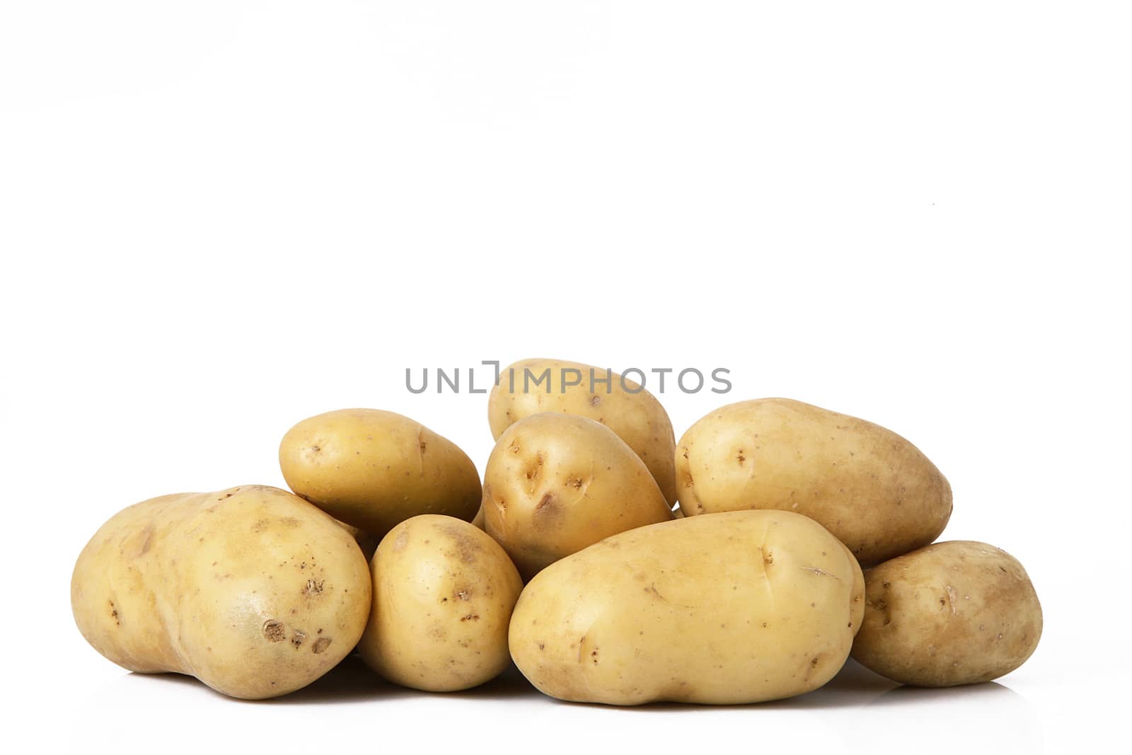 a fresh potatoes on white background