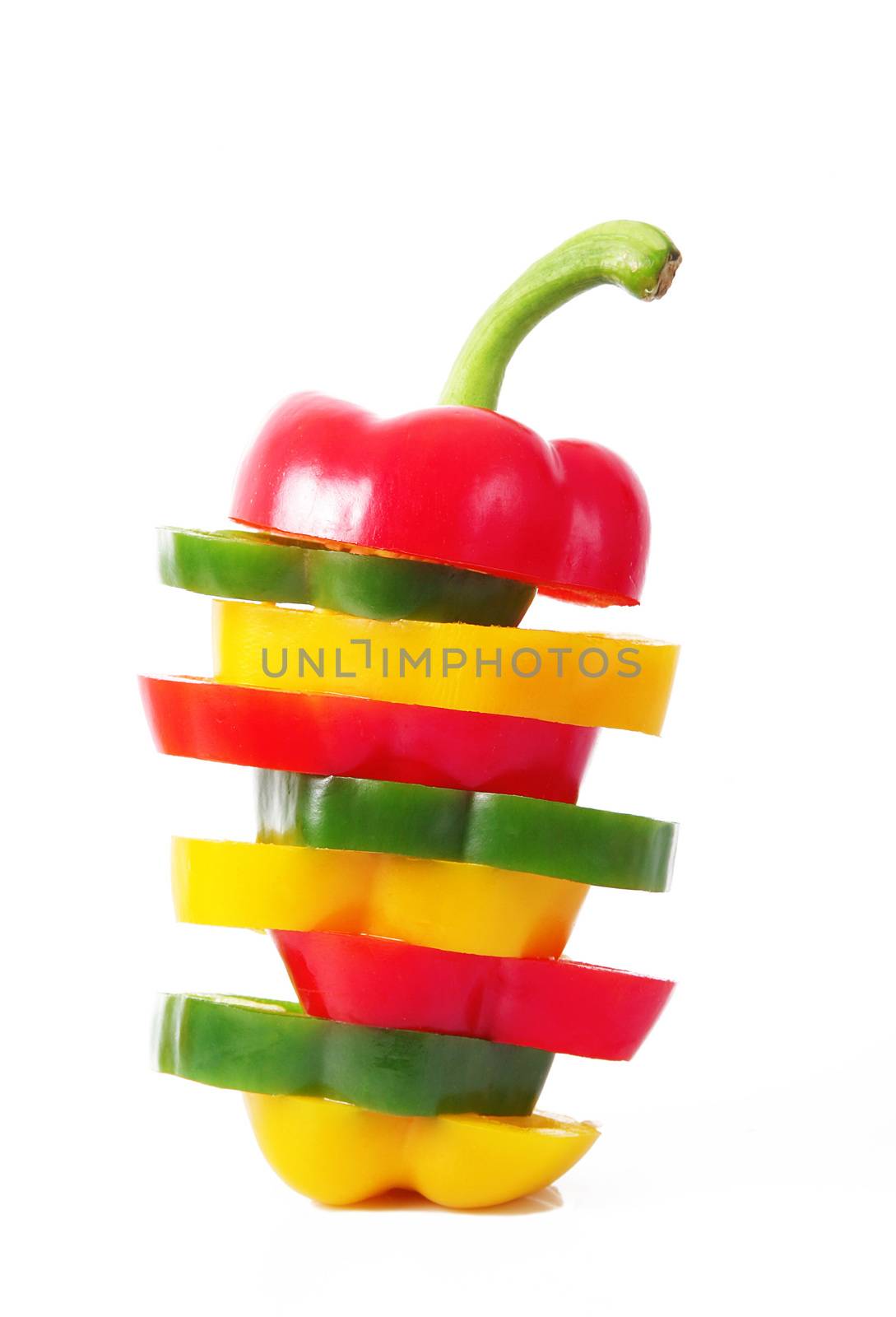 hot cut pepper on white background by photobeps