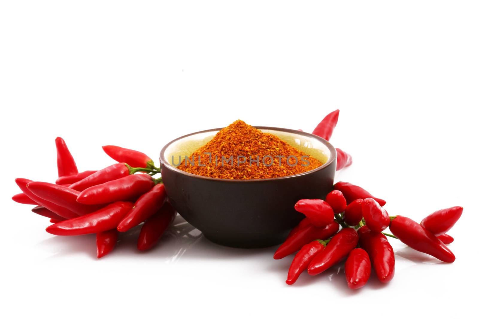 fresh hot peppers on white background