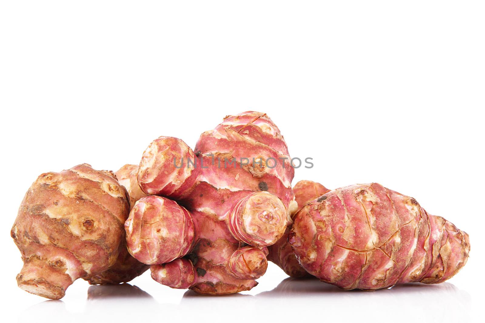 a fresh jerusalem artichoke on white background