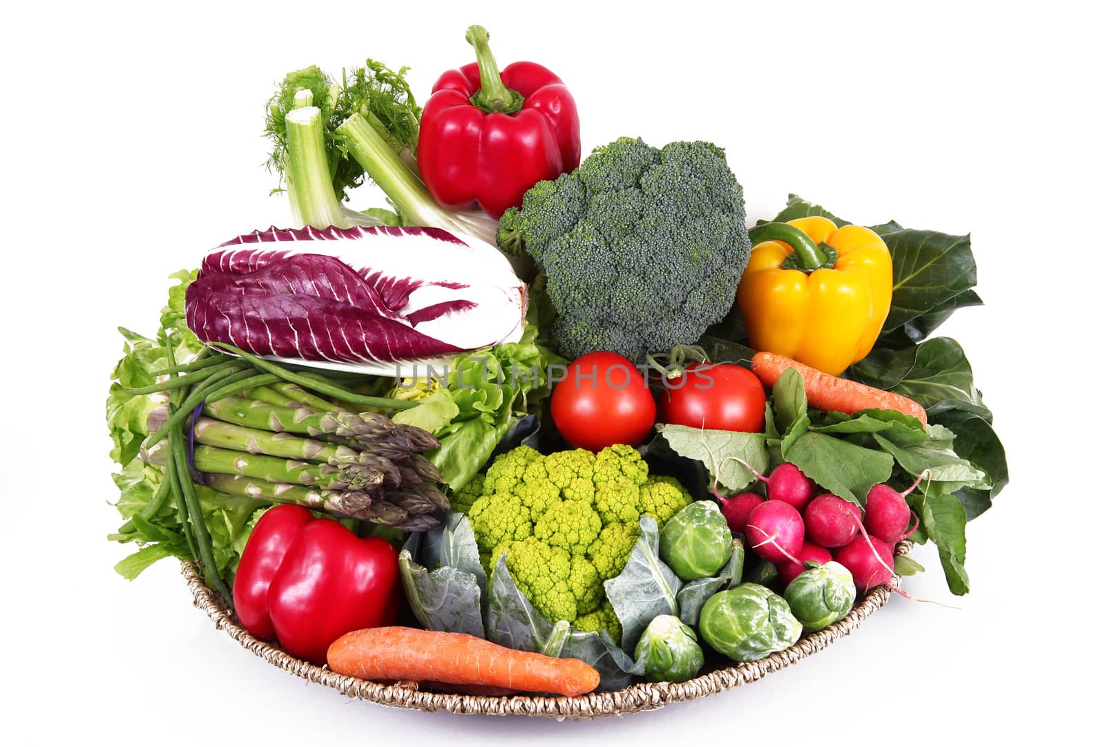 a fresh group of vegetables on white background
