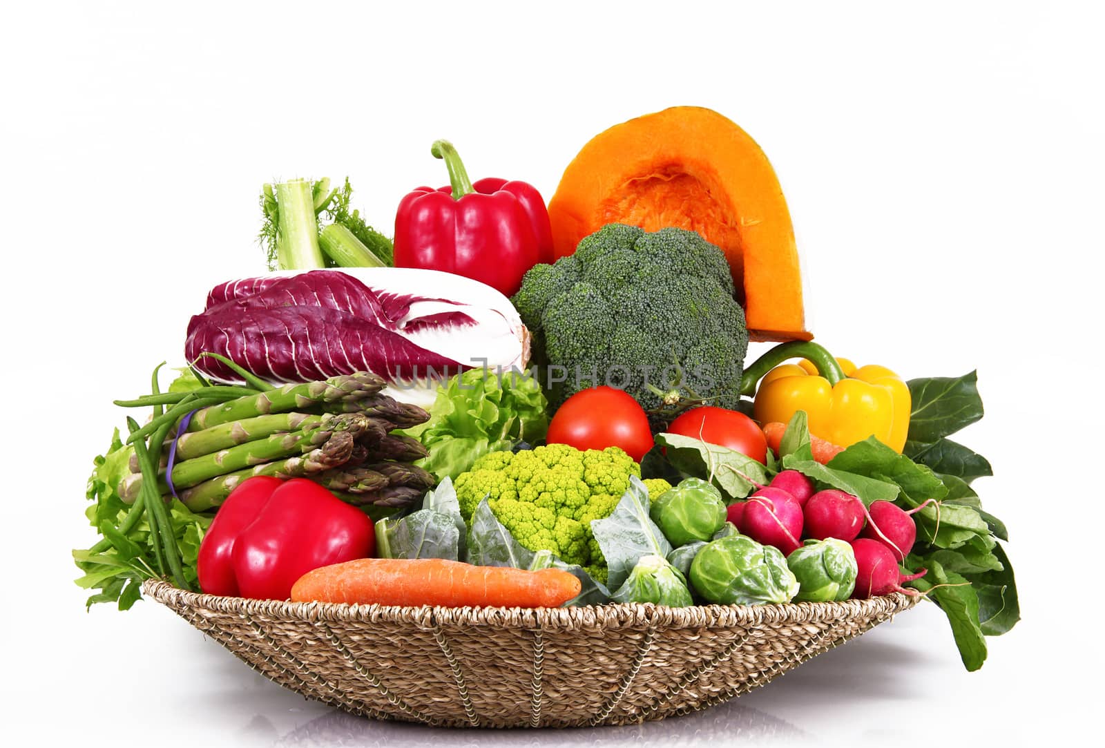 a fresh group of vegetables on white background