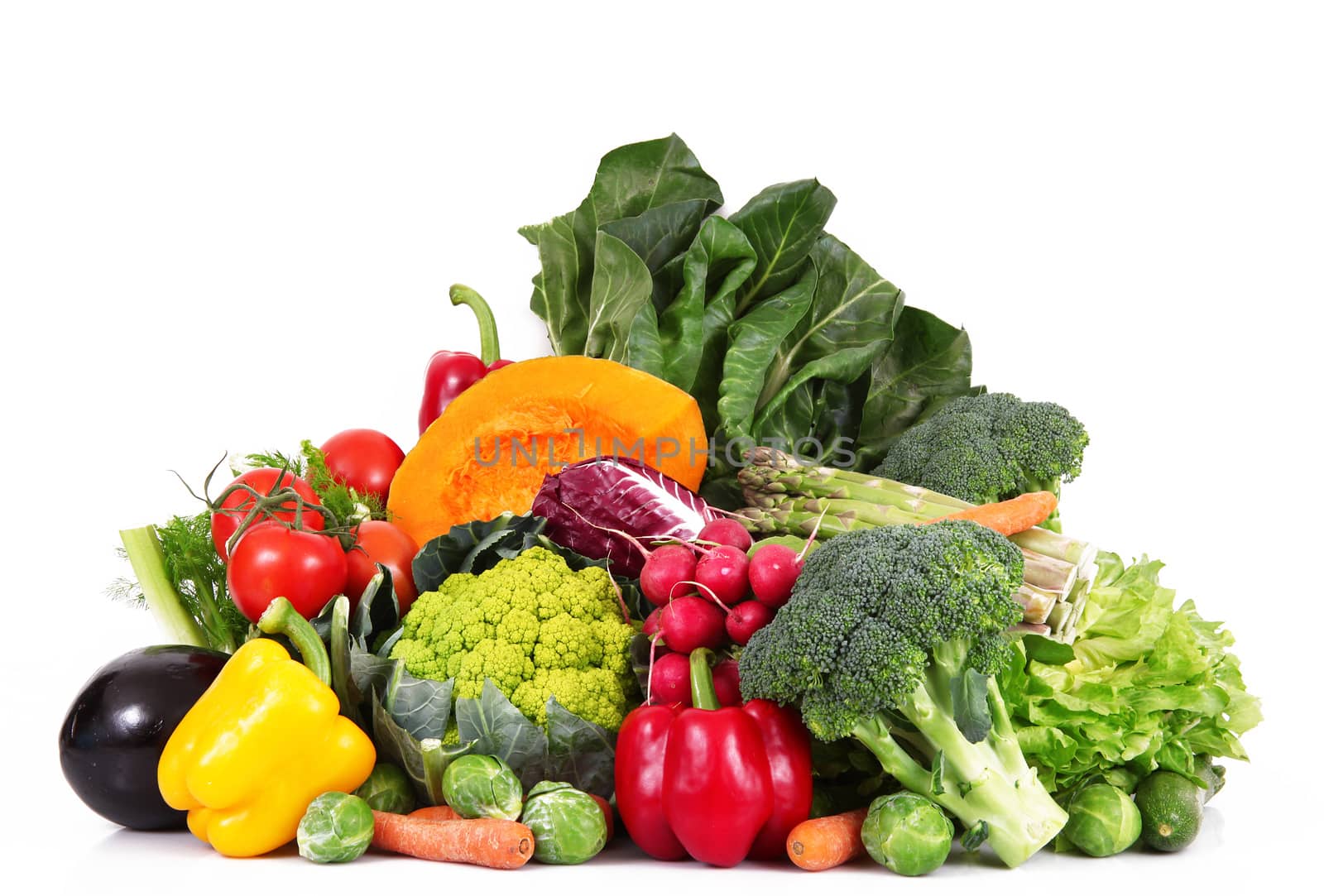 a fresh group of vegetables on white background