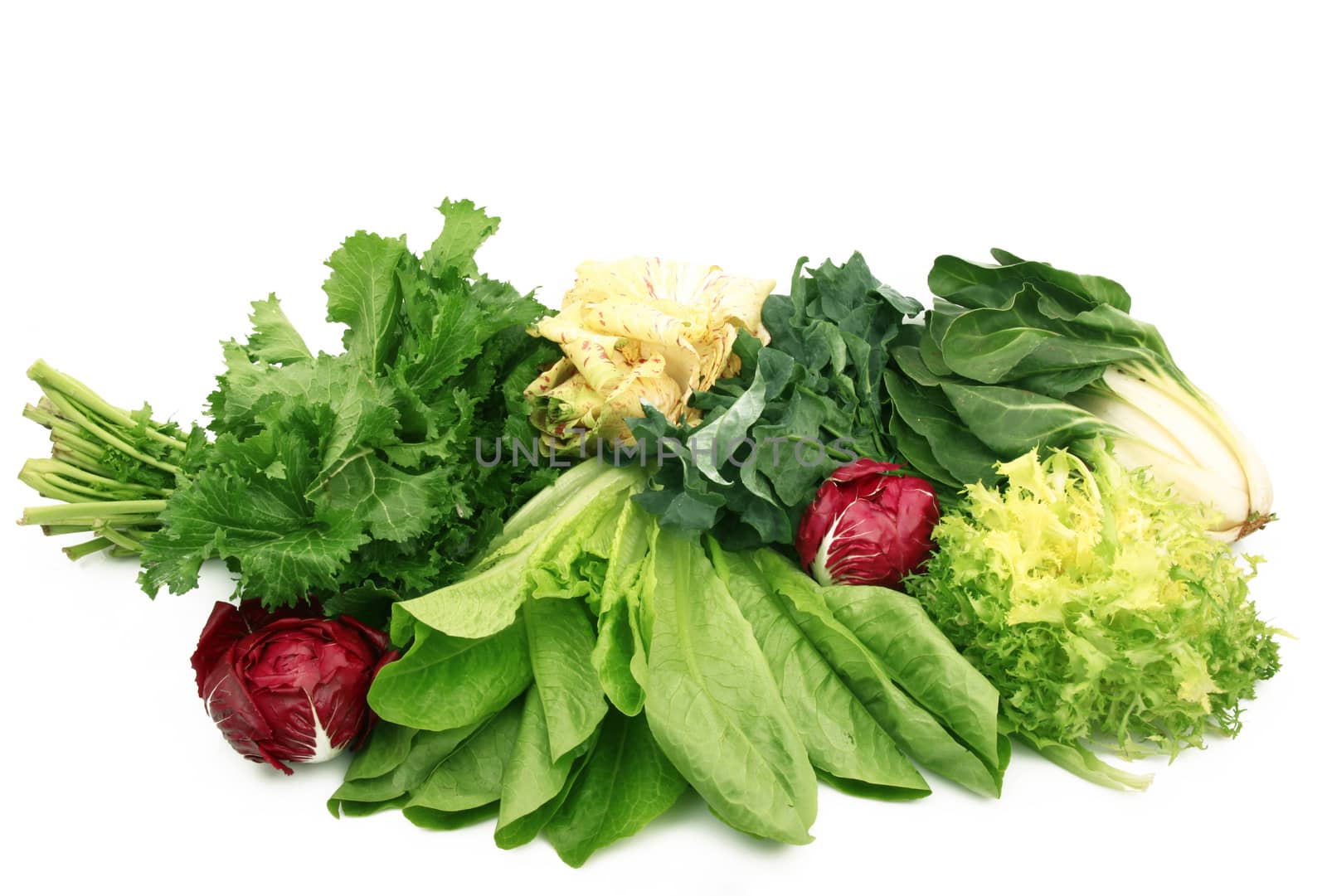 a fresh group of vegetables on white background