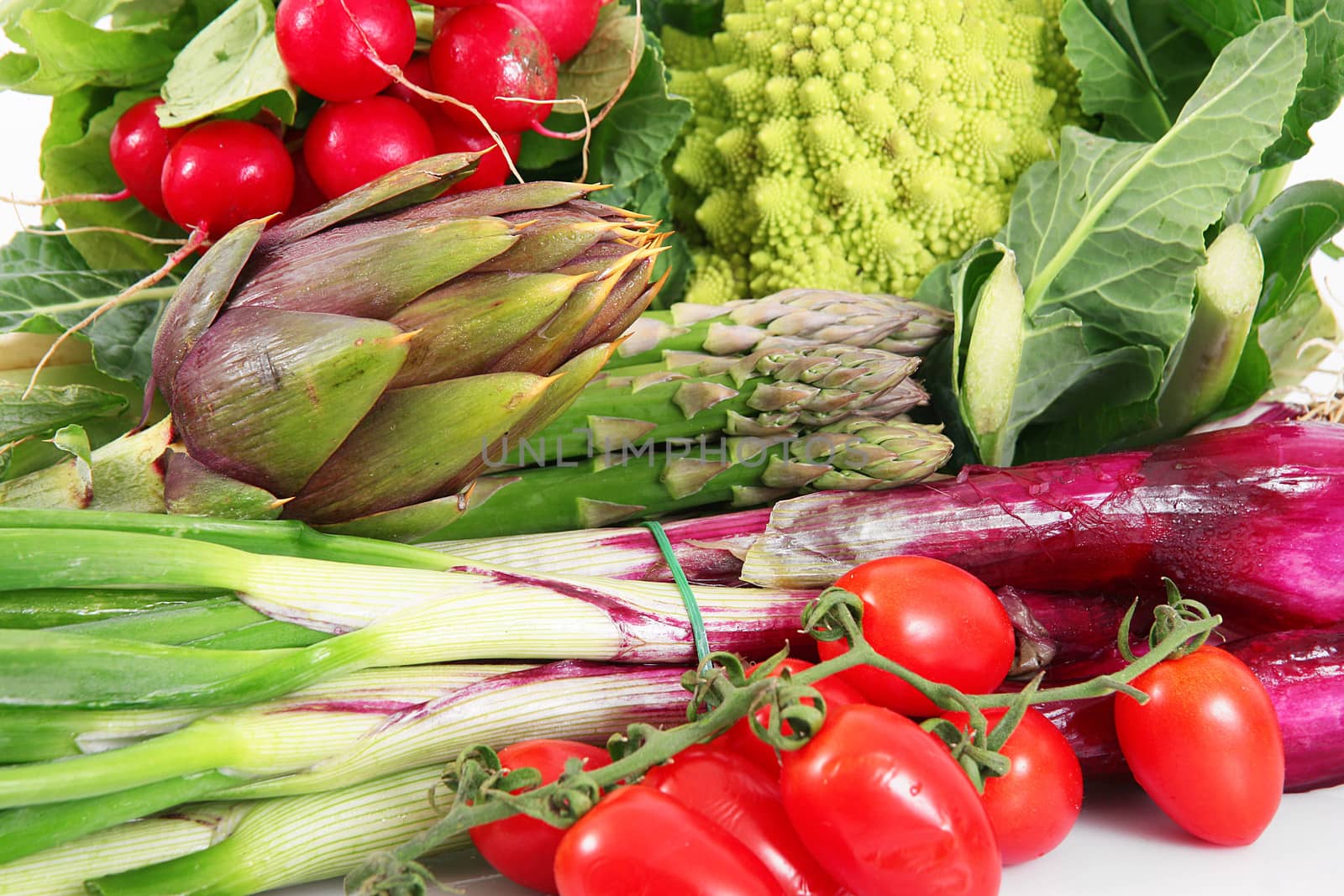 fresh group of vegetables on white background by photobeps