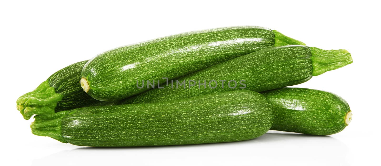 a fresh zucchini on white background