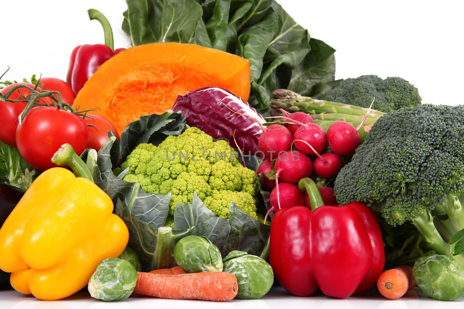 a fresh group of vegetables on white background