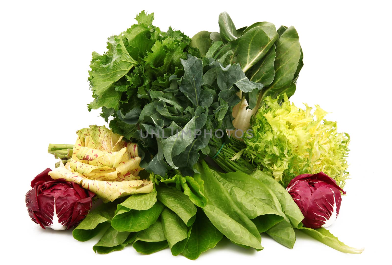 a fresh group of vegetables on white background