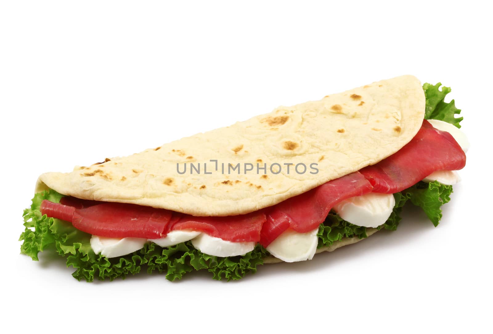italian flat bread with salade and ham