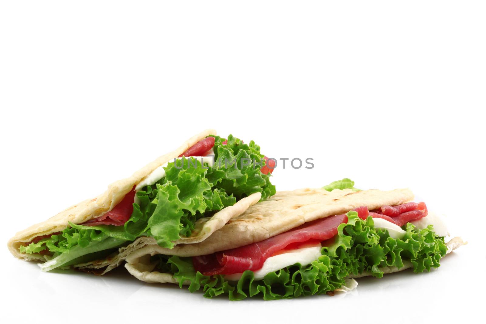 italian flat bread with salade and ham collage