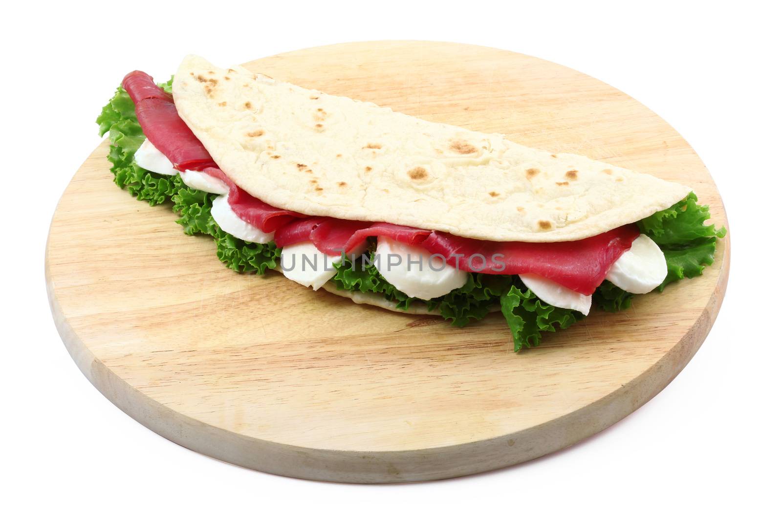 italian flat bread with salade and ham collage