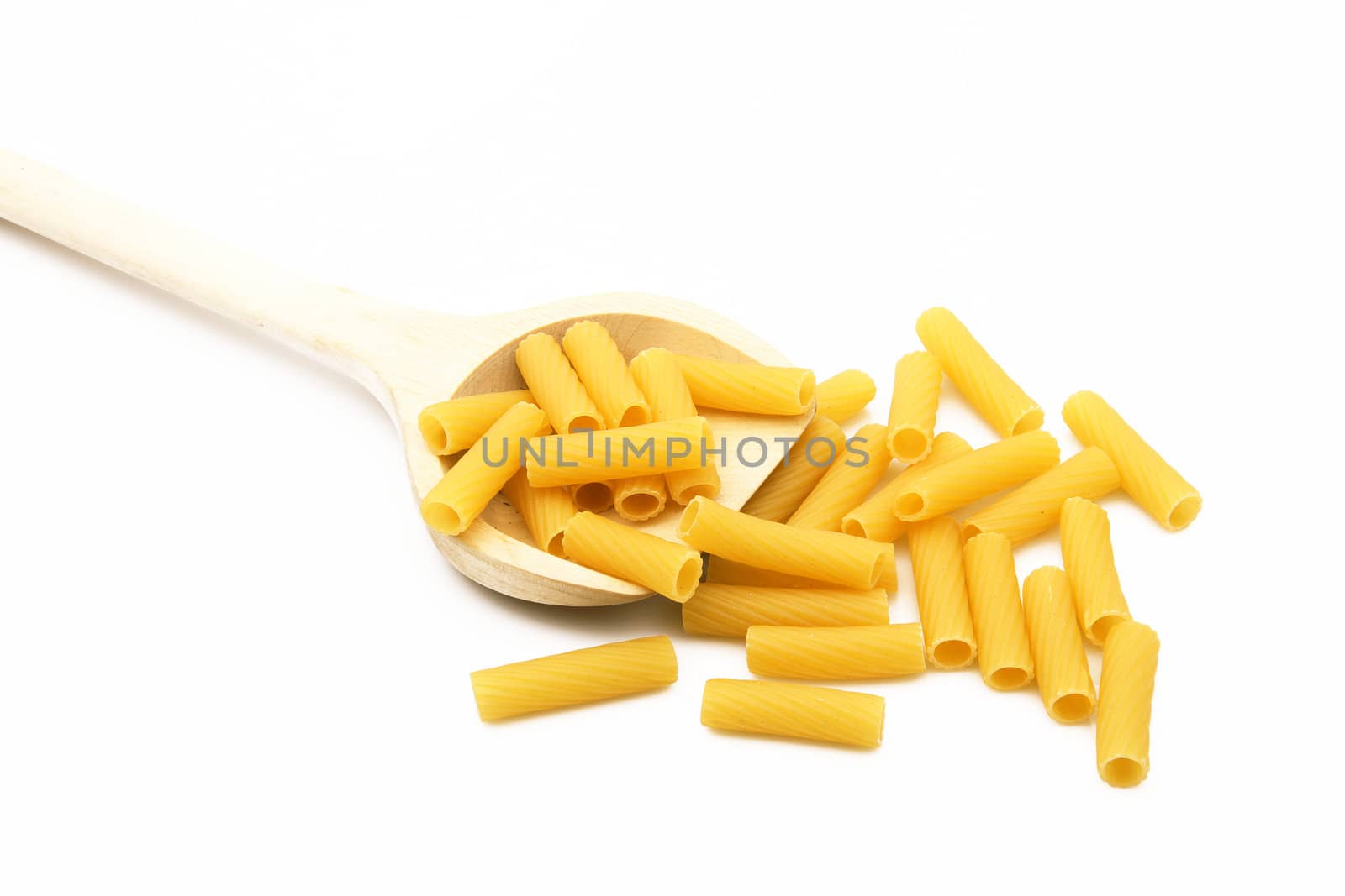 wood spoon with italian raw pasta on white background