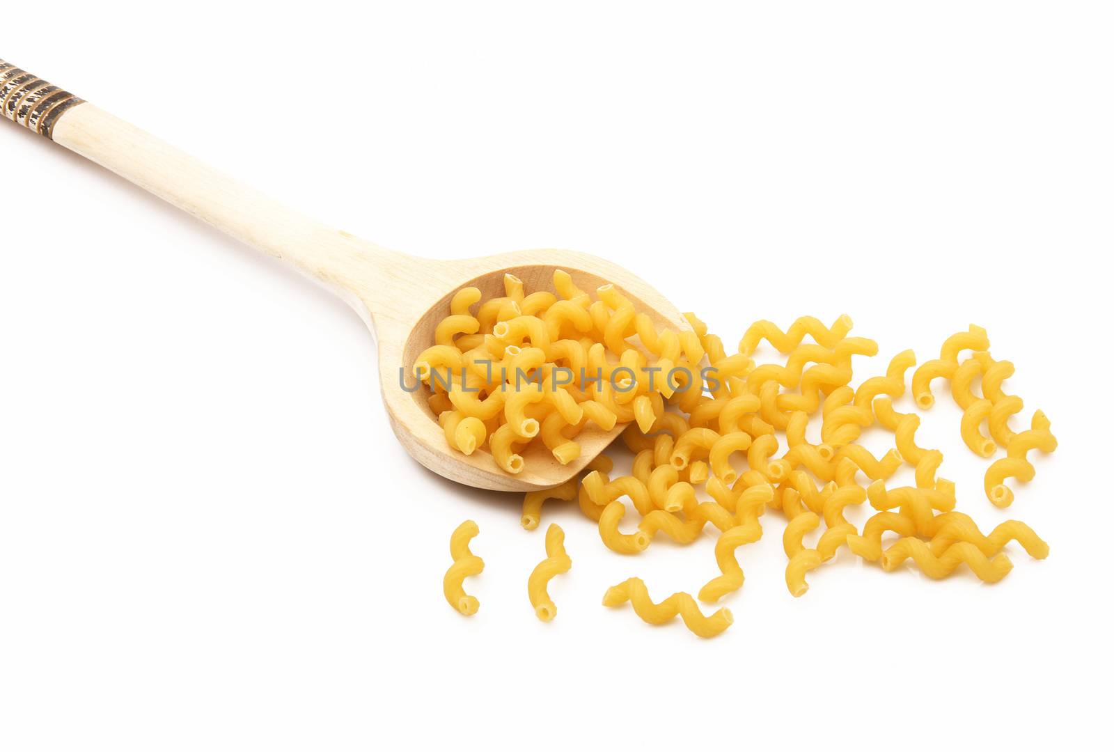 wood spoon with italian raw pasta on white background