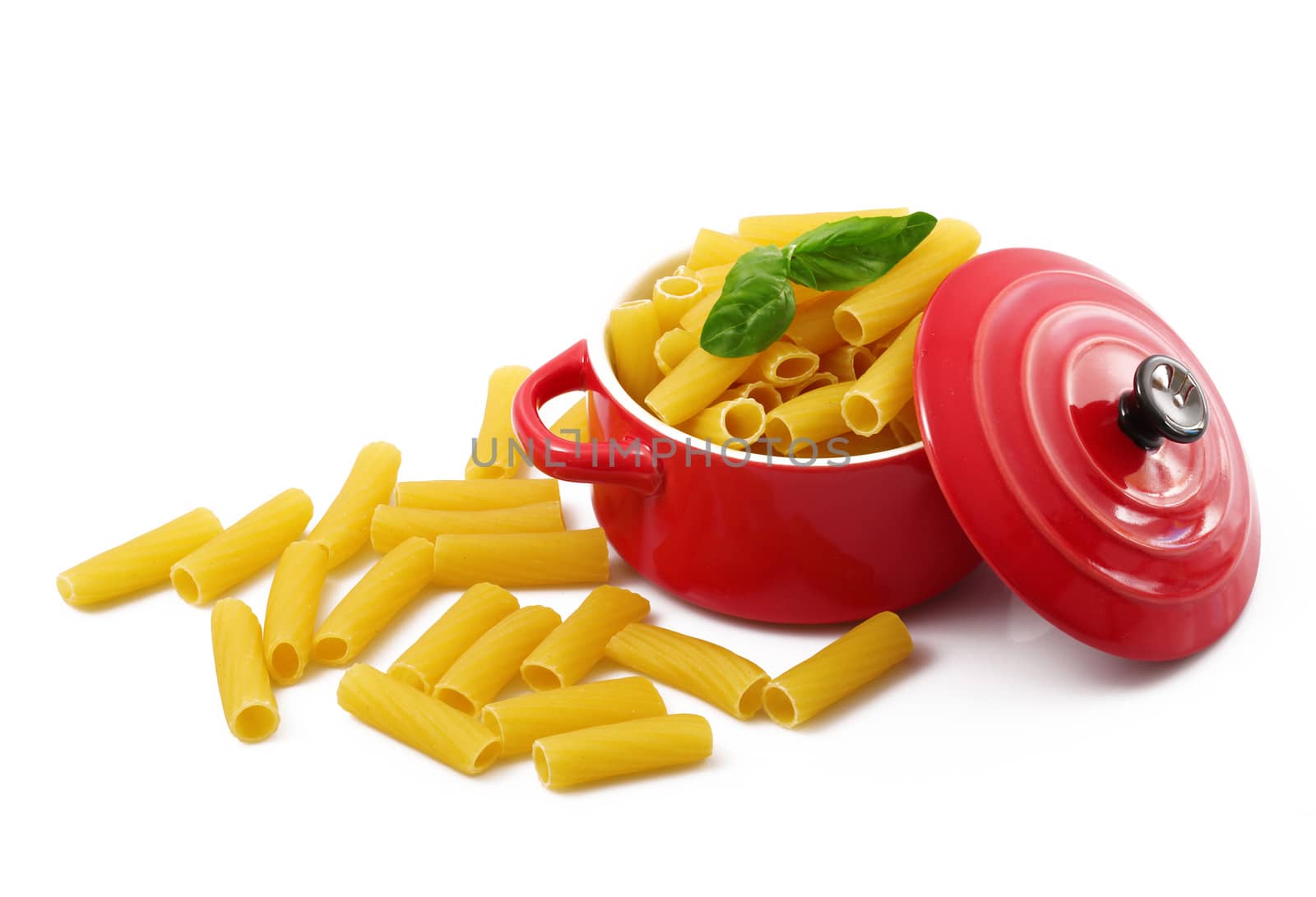 italian raw pasta in red pot