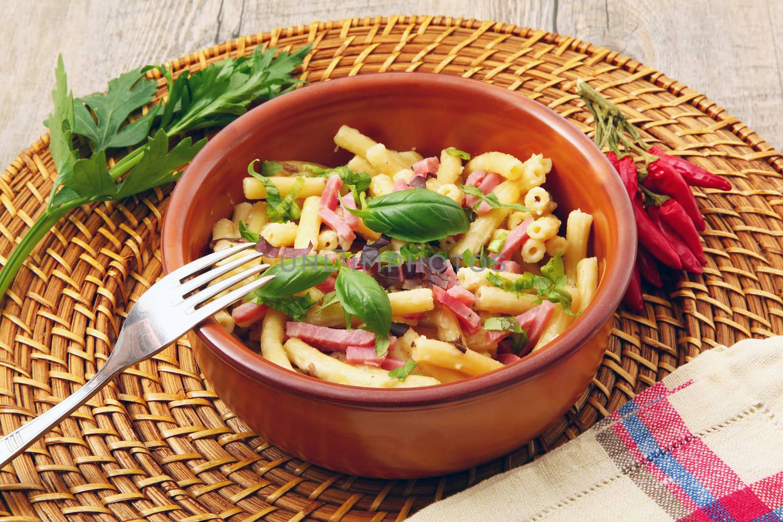 italian pasta with vegetables and ham