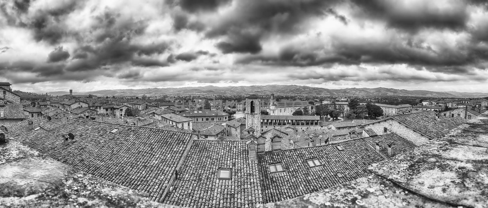 Panoramic view over the roofs of Gubbio, Italy by marcorubino