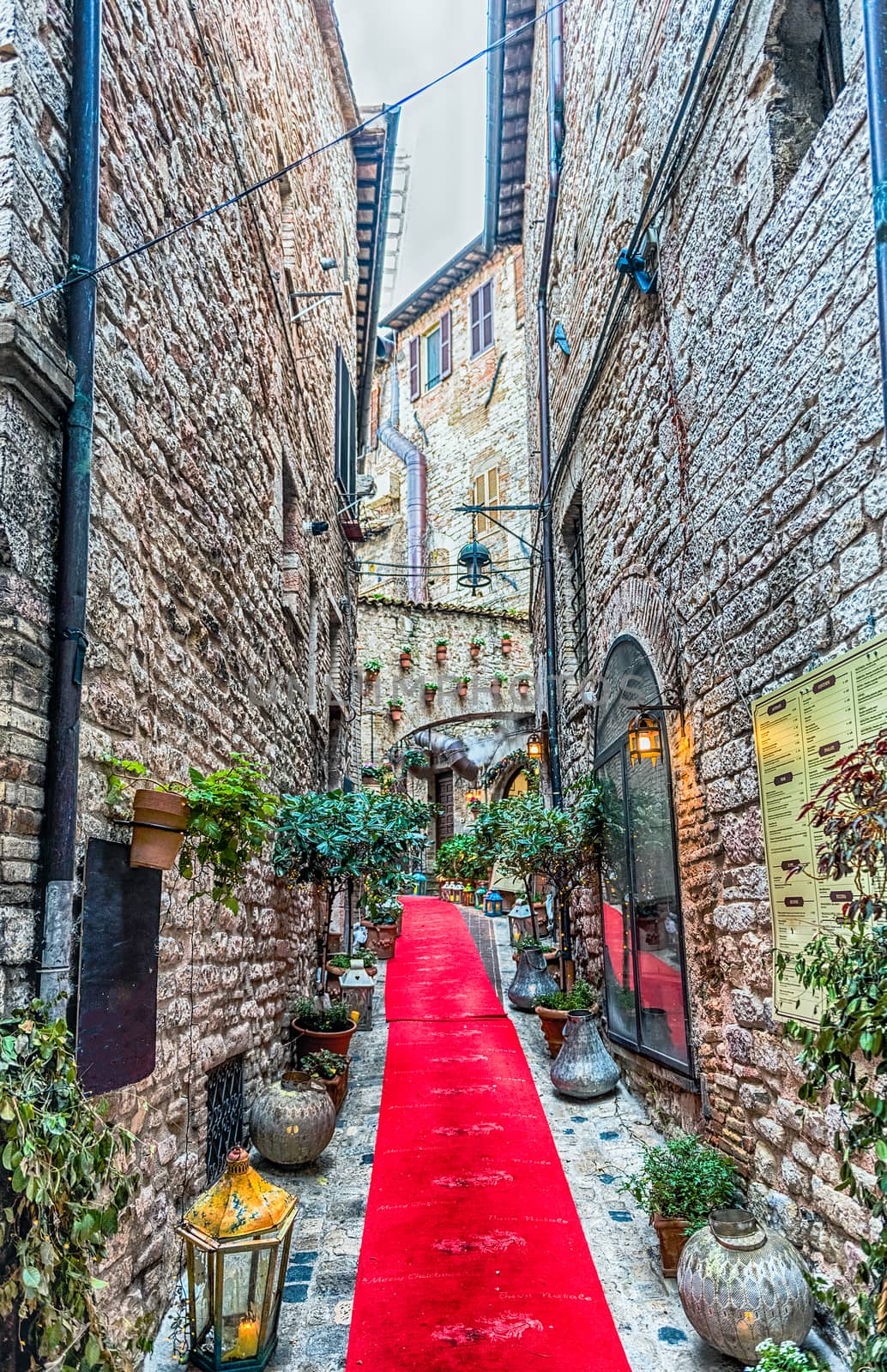 Scenic streets of the medieval town of Assisi, Umbria, Italy by marcorubino