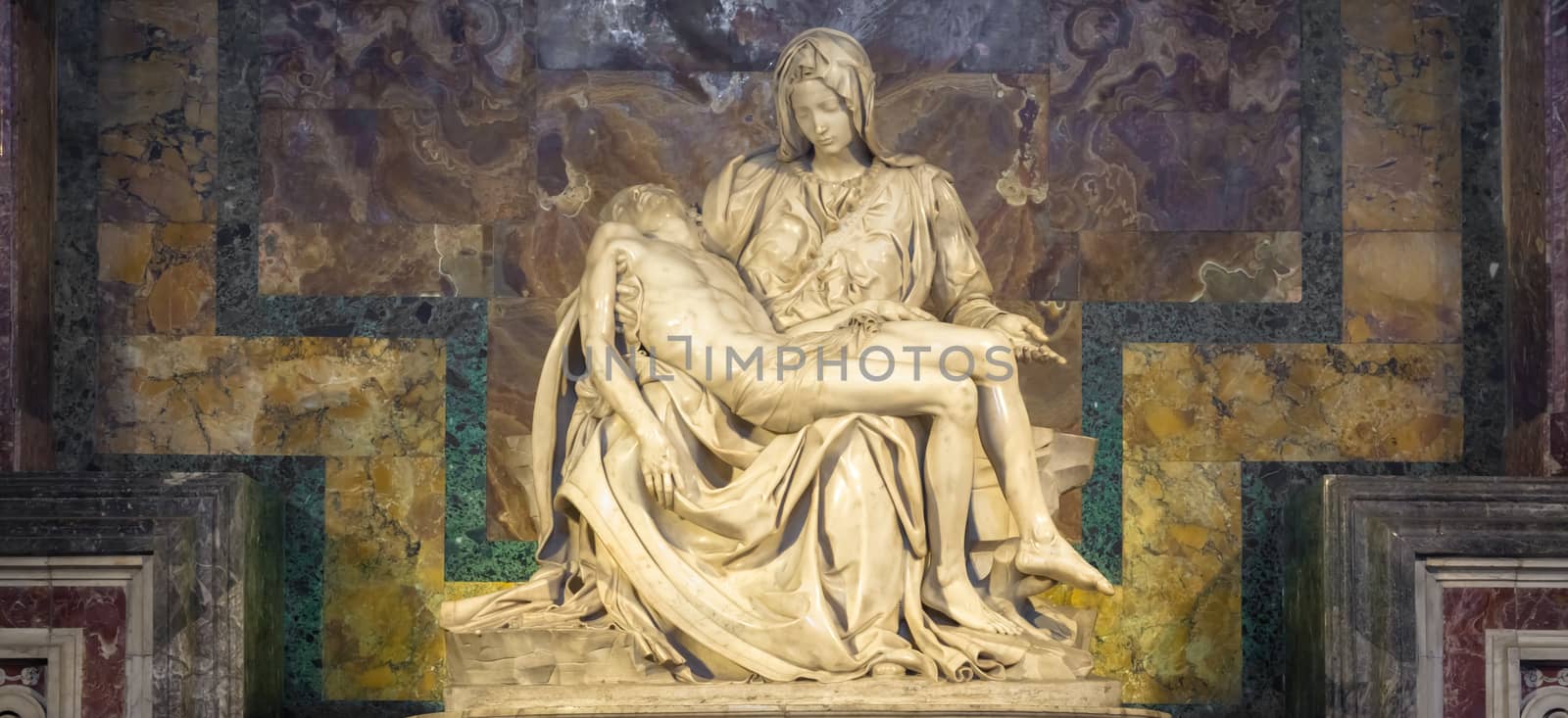 ROME, VATICAN STATE - August 28, 2018: Pietà di Michelangelo (The Pity), 1498-1499, located in St. Peter Basilica in Rome