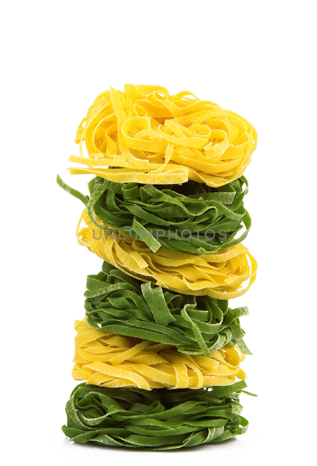 italian raw pasta on white background