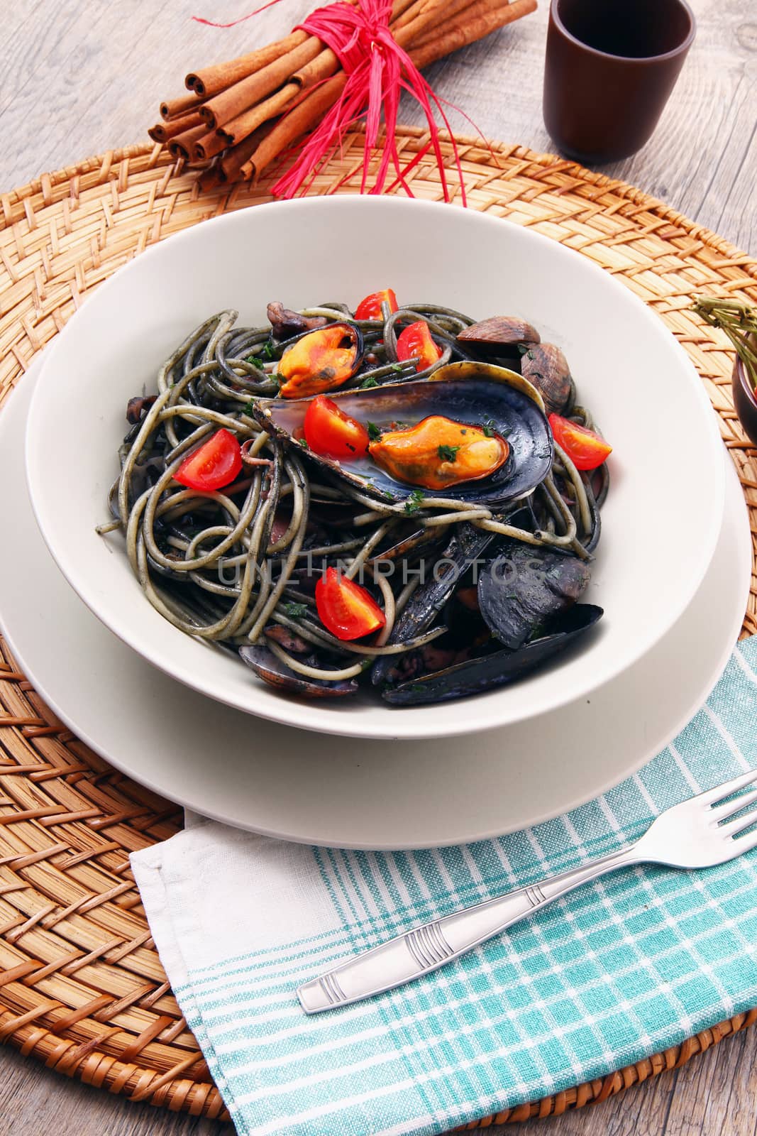 italian spaghetti with squid ink and mussels