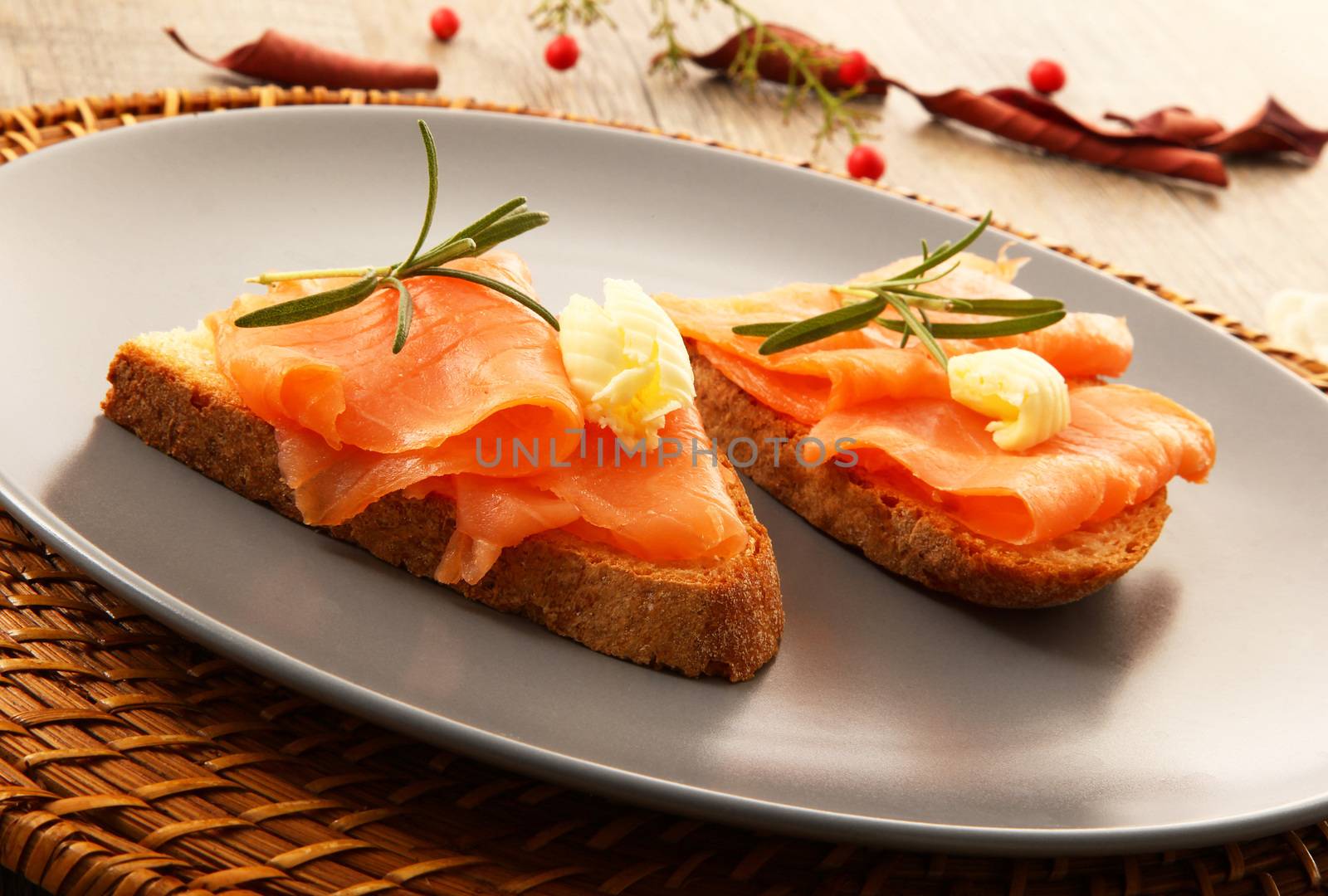 bread croutons with smoked salmon by photobeps