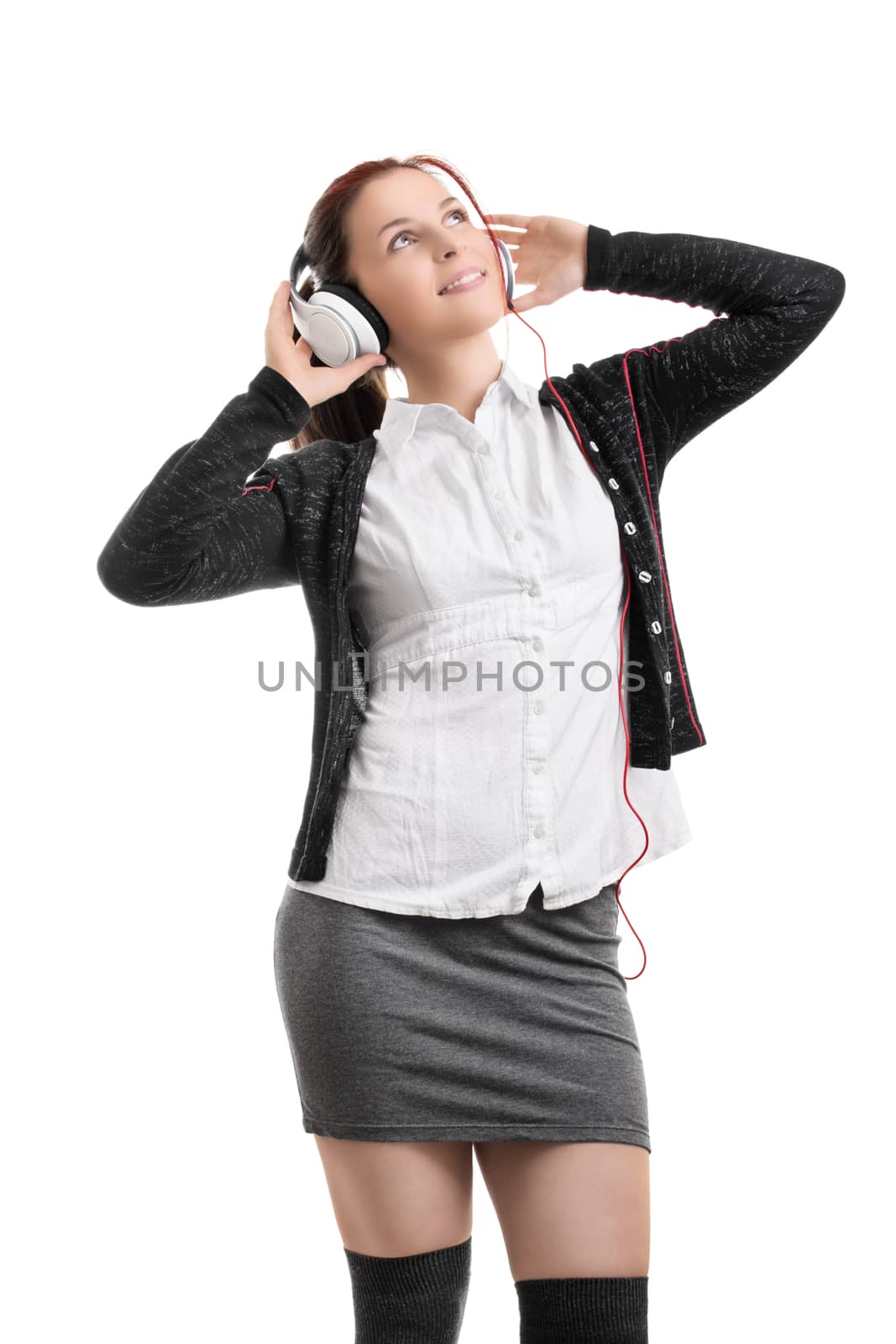 Young student girl with headphones listening to music by Mendelex