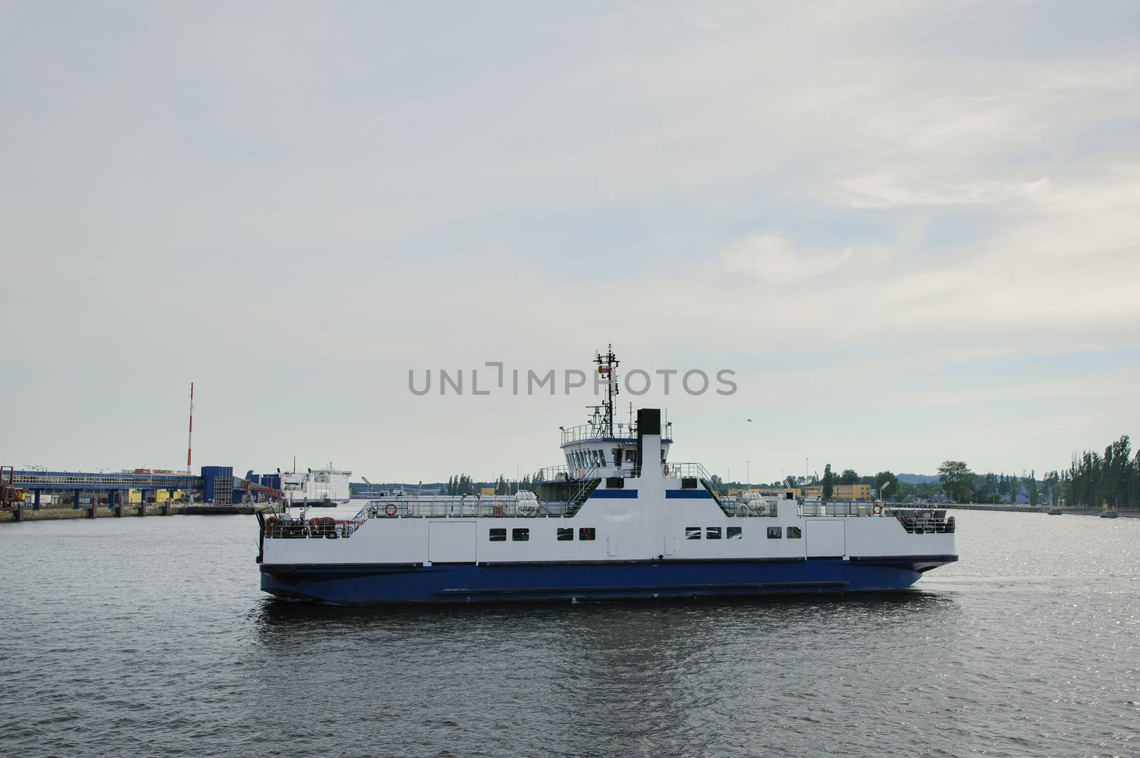 cruise ferry ship sailing in still water
