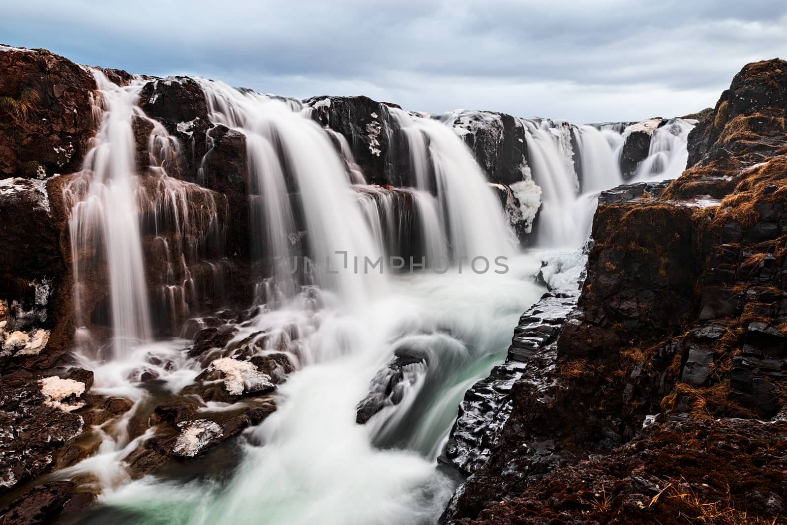 Closepu of Kolugljufur waterfall in Iceland in a cloudy day