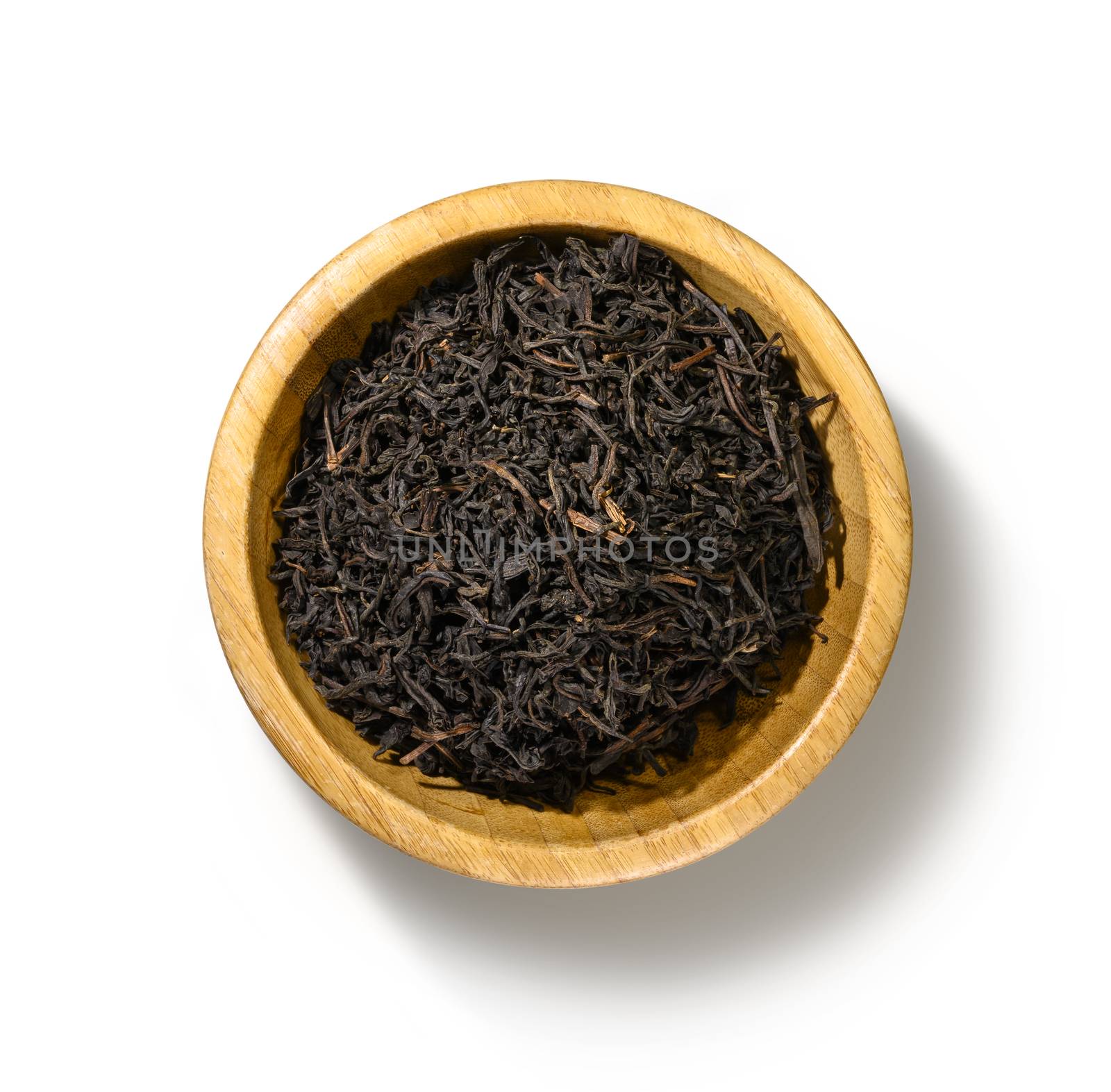 Black tea top view on white background.