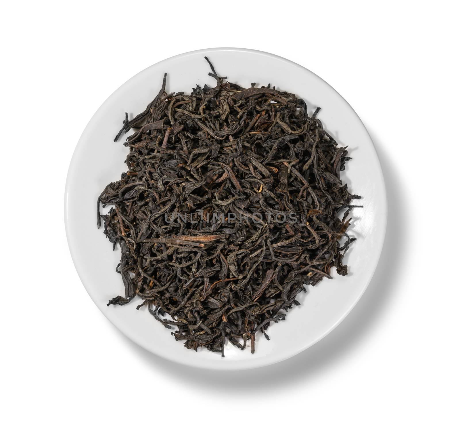 Black tea top view on white background.