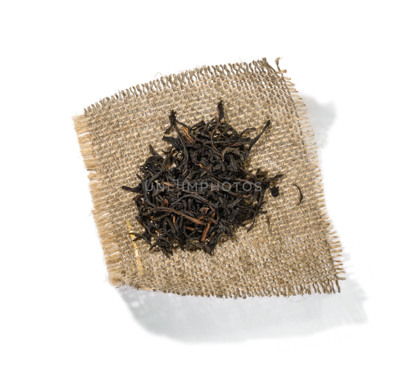 Black tea top view on white background.