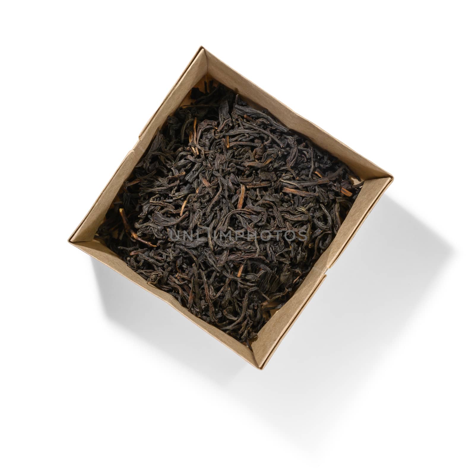 Black tea top view on white background.