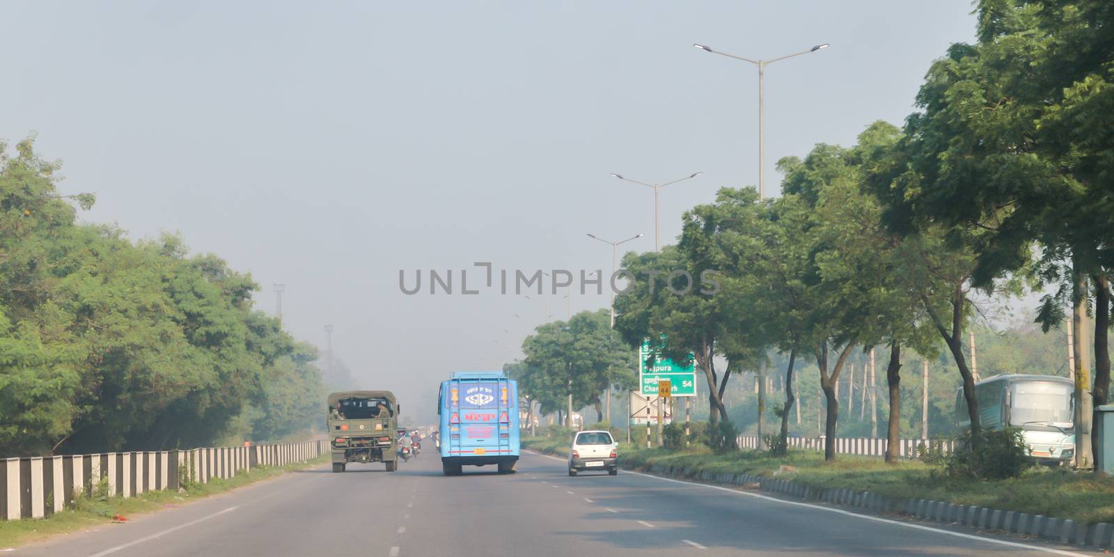 Chandigarh, Punjab, India, South Asia November 2019 - Landscape view of City Street of Chandigarh, the cleanest city of India. by sudiptabhowmick