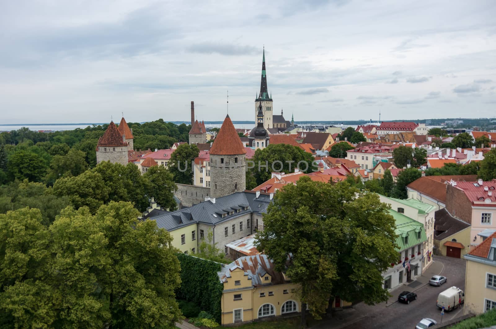 Tallinn, Estonia - July 29, 2017:  Aerial cityscape with Medieval Old Town, St. Olaf Baptist Church and Tallinn City Wall, Tallinn, Estonia