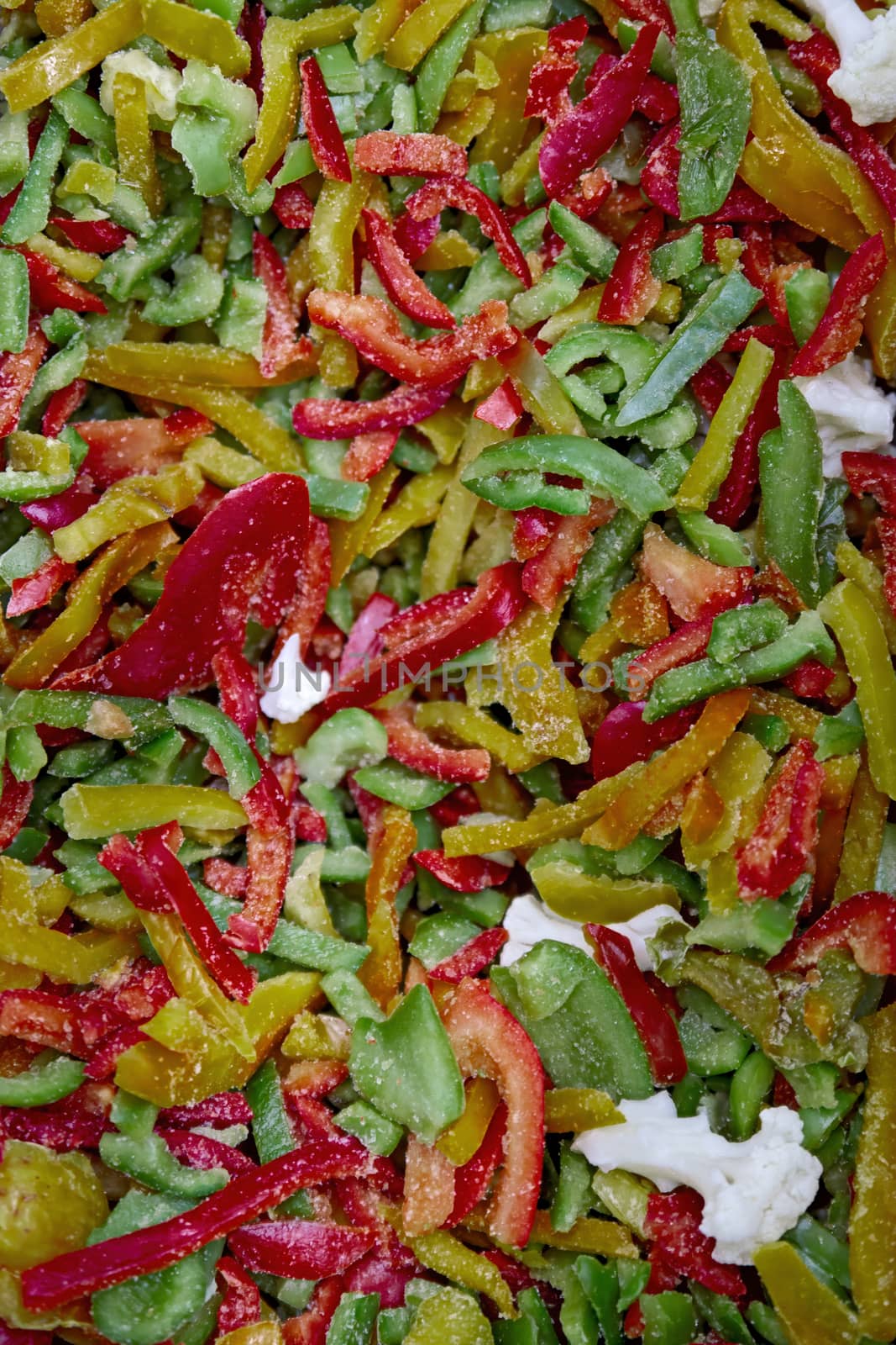 Brightly colored seasonal vegetables are frozen and sold at the grocery store. Natural products that are suitable for quick cooking healthy food.